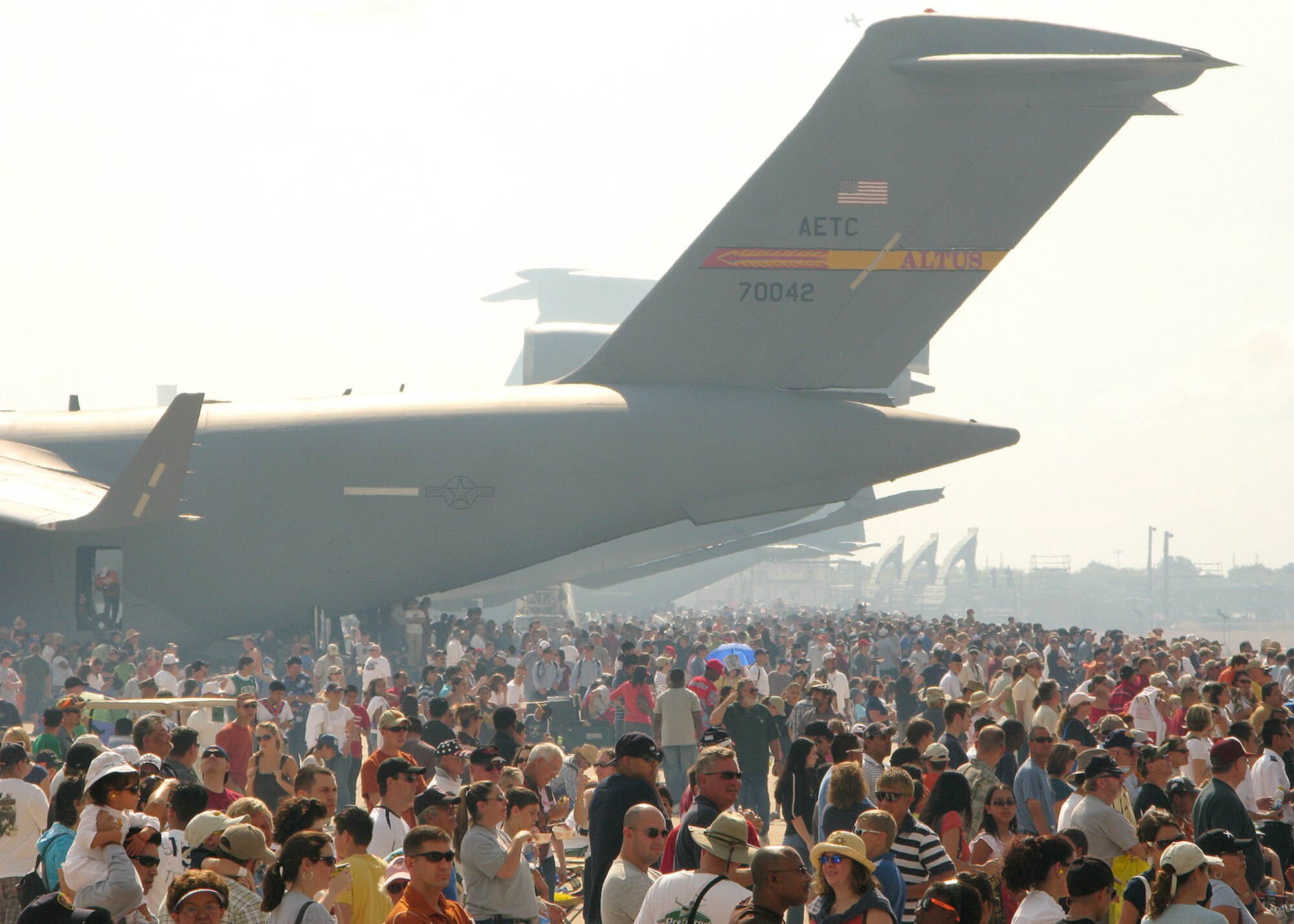 Approximately 260,000 people attended Lackland's AirFest 2008 Saturday and Sunday. The Navy Blue Angels demonstration team, the Army parachute-jumping Golden Knights team, and Tora! Tora! Tora!, a re-enactment of Pearl Harbor, headlined the show at Kelly Field Annex. Other performances included the F-15E Strike Eagle, the F-16 Fighting Falcon and the F-22 Raptor. (USAF photo by Robbin Cresswell)  