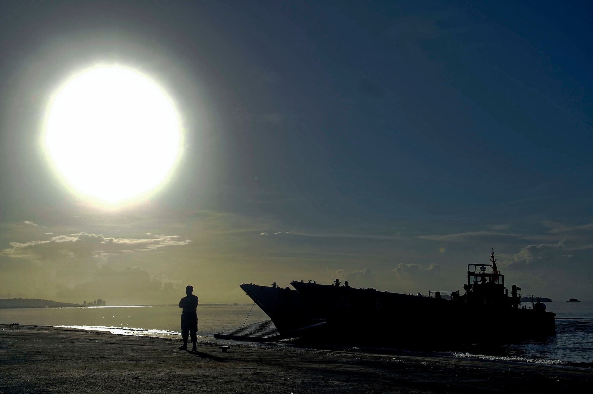A Navy Sailor waits to transport a team of medics to the USS Kearsarge on a landing craft mechanized amphibious unit in support of Operation Continuing Promise 2008 Nov. 4 in Trinidad and Tobago. (U.S. Air Force photo/Master Sgt. Cecilio Ricardo)