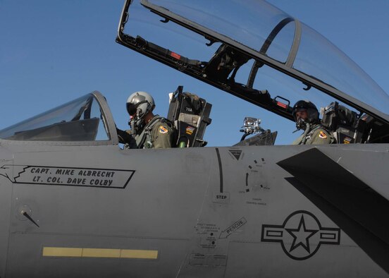Captain Kenneth Madsen from the 333rd Fighter Squadron and bassmaster pro-angler Marty Stone prepare for departure for an orientation flight here Oct. 29 on Seymour Johnson Air Force Base, N.C. Mr. Stone toured the base prior to receiving an orientation flight because of his abilities to communicate the 4th Fighter Wing and United States Air Force mission to worldwide audiences.(US Air Force photo By Airman First Class Gino Reyes)(Released)