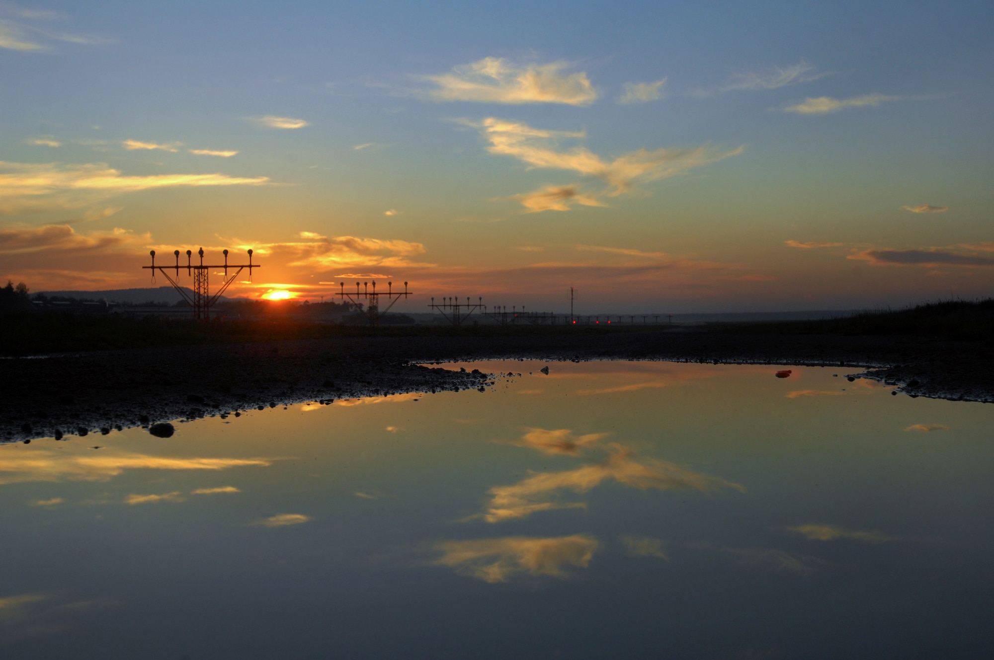 The sun sets over the flightline Nov. 3 at Ramstein Air Base, Germany. Ramstein AB officials handle more than 85 aircraft operations daily. (U.S. Air Force photo/Airman 1st Class Kenny Holston) 