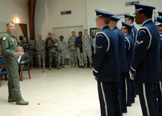Col. John "Red" Millander speaks to members of the honor guard and other Team Charleston members after the ribbon cutting ceremony for their new training facility in Hunley Park Nov. 5. The honor guard relocated to a renovated building in Hunley Park to provide a better training environment. Colonel Millander is the 437th Airlift Wing commander. (U.S. Air Force photo/ Airman 1st Class Katie Gieratz)