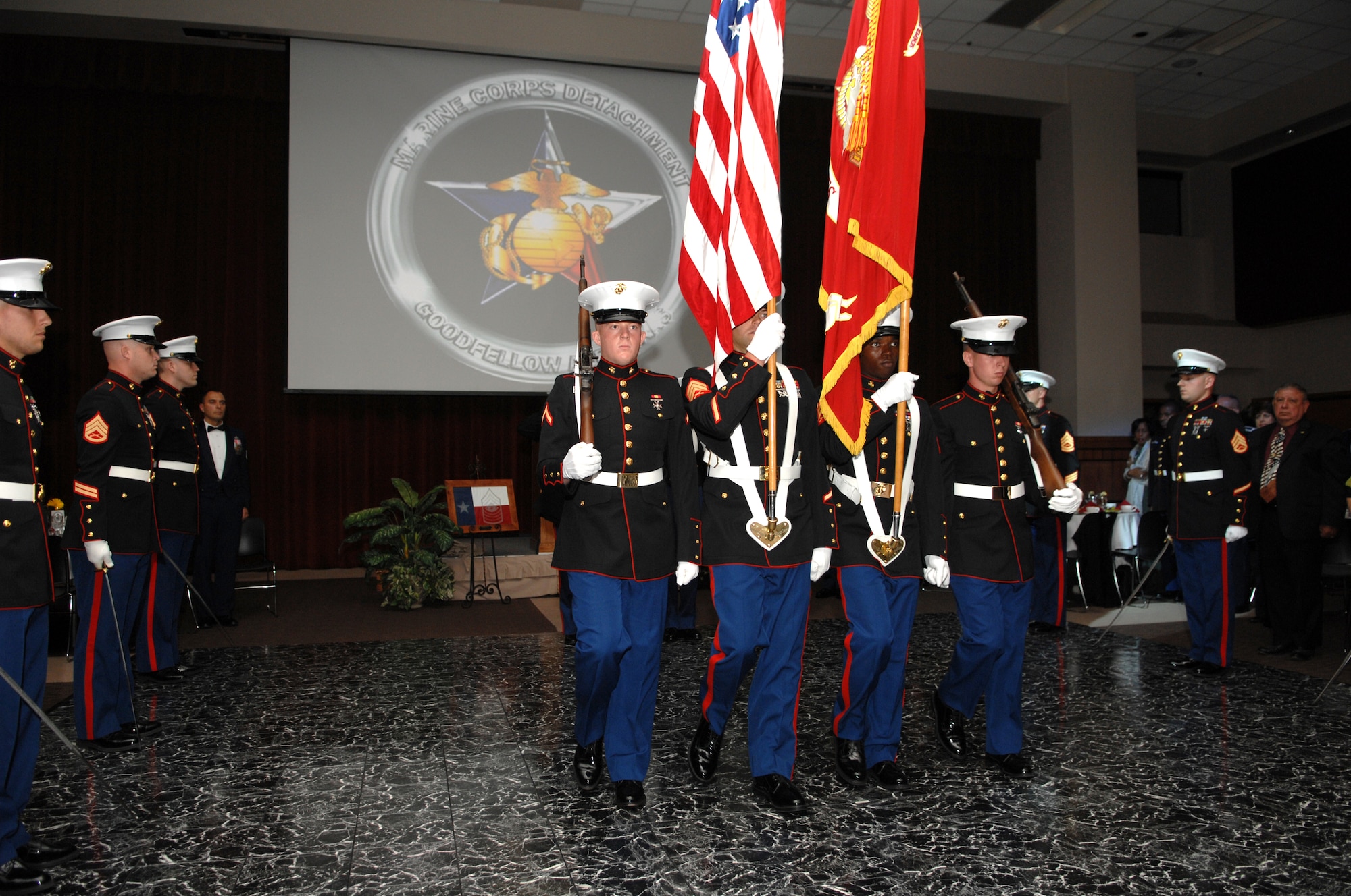 Marines render courtesy to the flag during the 2008 Marine Corps Ball Nov. 1 at Angelo State University. (U.S. Air Force photo by Tech. Sgt. John Barton)