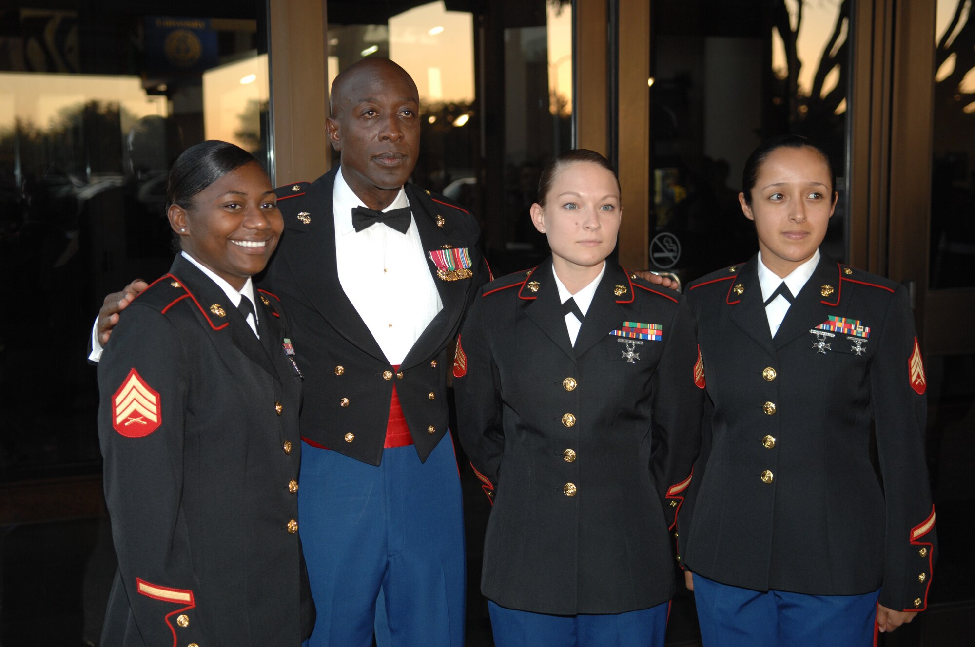 Marine Sgt. Chissy Allen, Sgt, Maj. of the Marine Corps Carlton Kent, Marine Sgt. Jessica Speitel and and Marine Sgt. Lola Uribe pose at the 2008 Marine Corps Ball Nov. 1. (U.S. Air Force photo by Tech. Sgt. John Barton)