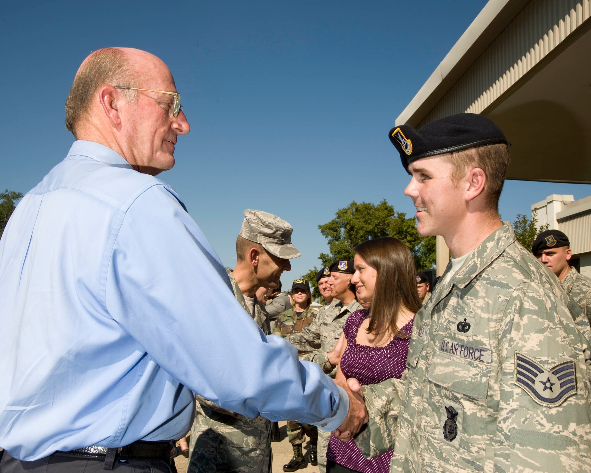 Fort Walton Beach Mayor Mike Anderson welcomes Staff Sgt. Nicholas Bradley home from Walter Reed Army Medical Center.  The 96th Security Forces Airman  was seriously injured when an improvised explosive device exploded near his vehicle as he was serving with a convoy traveling in Afghanistan. (USAF photo/Craig McDonnell)