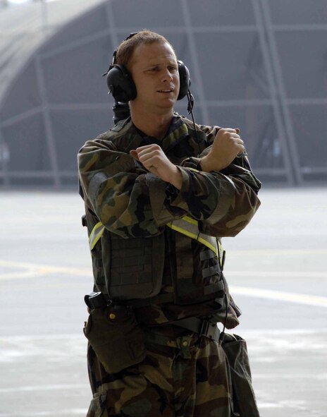 OSAN AIR BASE, Republic of Korea -- Staff Sgt. George Pastere, 25th Aircraft Maintenance Unit crew chief, recovers a “contaminated” A-10 Thunderbolt, during Exercise Beverly Bulldog 08-04 Nov. 6. The week-long exercise tests Team Osan’s readiness and ability to execute combat operations, receive follow-on forces and defend the base from attack. (U.S. Air Force/Staff Sgt. Lakisha Croley)