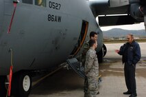 Retired Chief Master Sgt. John Wright describes the extensive repairs he made to C-130 tail number 0527, nearly three decades ago, to Senior Airmen Timothy Mills and Jake Williams, Oct. 27 2008 on the Ramstein Air Base flight line. Chief Wright spent nearly nine months working on the aircraft after it left the runway in a landing mishap in 1980. The aircraft, now maintained by Airmen Mills and Williams, is still active today thanks to those repairs. This is the chief's first visit to Germany since he retired from active duty in 1991. (U.S. Air Force photo Capt. John Ross)
