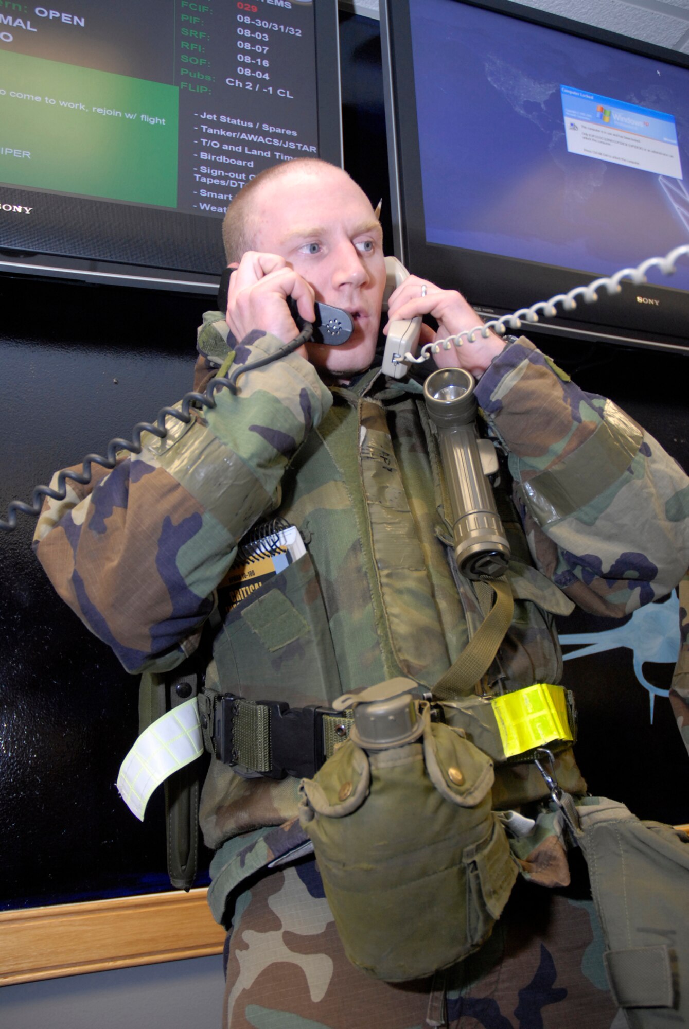 Capt. Patrick Pierson coordinates aircraft flying missions and while investigating a suspected injured pilot at Kunsan Air Base, Republic of Korea during the Peninsula-Wide Operational Readiness Exercise, Nov. 5, 2008. Kunsan is participating in the PENORE as a test of its wartime capabilities and response actions (U.S. Air Force Photo by SSgt Jason Colbert)