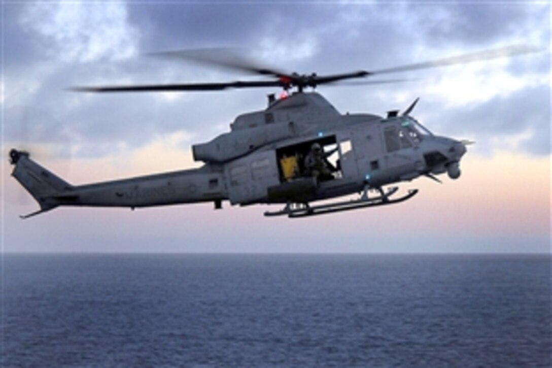 U.S. Marines aboard new Bell UH-1Y helicopter fly toward the flight deck of the amphibious assault ship USS Boxer during an exercise in the Pacific Ocean, Nov. 2, 2008. Boxer is the first ship in the fleet to have the new helicopter aboard as part of its rotary wing aircraft augmentation for a scheduled deployment early next year.