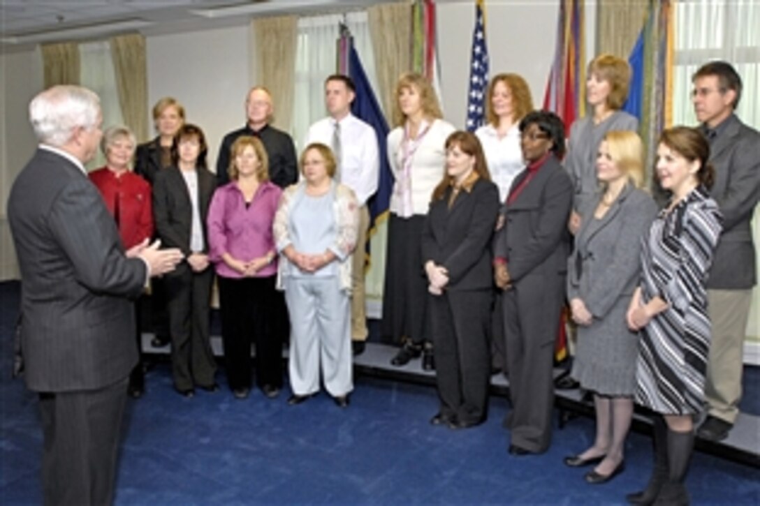 Defense Secretary Robert M. Gates thanks a group of top-rated teachers who work for the Defense Department's Dependent School System for their service during their visit to his Pentagon office, Nov. 6, 2008.  Each teacher was selected as "Teacher of the Year" in his or her school district.