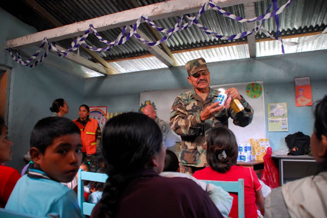 EL HORNO, Honduras - Honduran Air Force Sergeant Major Luis Aleman informs the patients on the importance of preventitive medicine Nov. 5. U.S. servicemembers and Honduran officials teamed up during a two-day medical readiness exercise, which helped more than 650 people. (U.S. Air Force photo by Staff Sgt. Joel Mease)