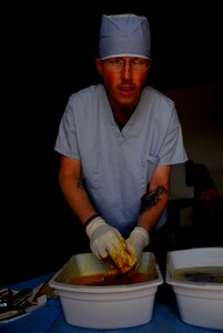 EL HORNO, Honduras - Air Force Tech Sgt. Andrew Baldwin, Joint Task Force-Bravo Medical Element, disinfects dental utensils during a two-day medical readiness exercise Nov. 5. During the MEDRETE U.S. servicemembers worked the Honduran Ministry of Health to give free medical care to more than 650 people in the remote mountain area of El Horno. (U.S. Air Force photo by Staff Sgt. Joel Mease)