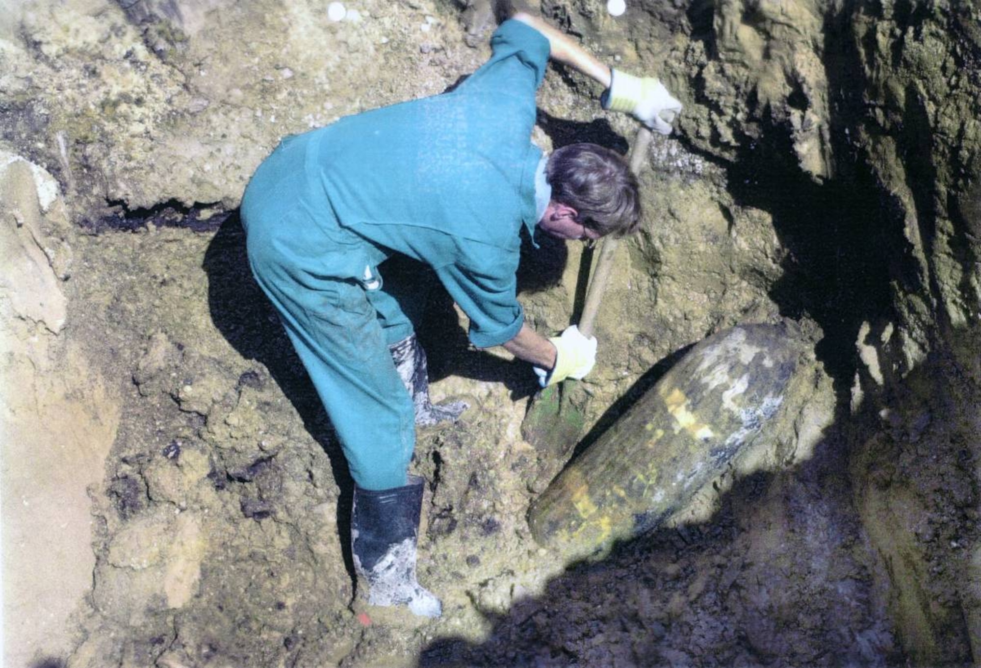 An unexploded ordnance disposal expert excavates a 500-pound bomb dropped on Germany during World War II. (Courtesy photo)