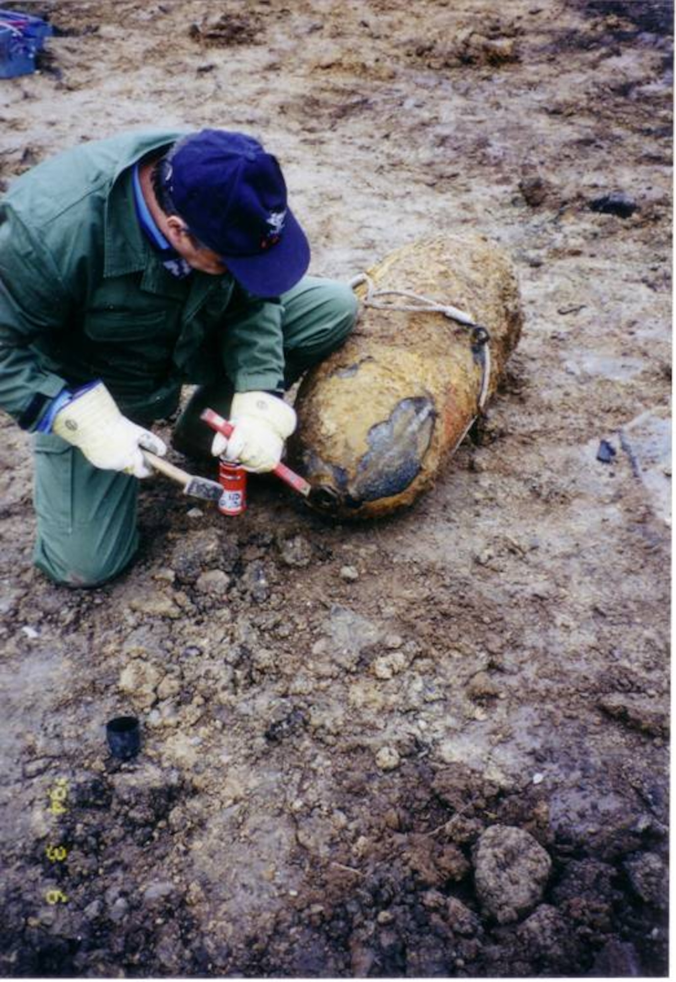 An unexploded ordnance disposal expert works to defuse a World War II 500-pound bomb dropped on Germany during the war. (Courtesy photo)