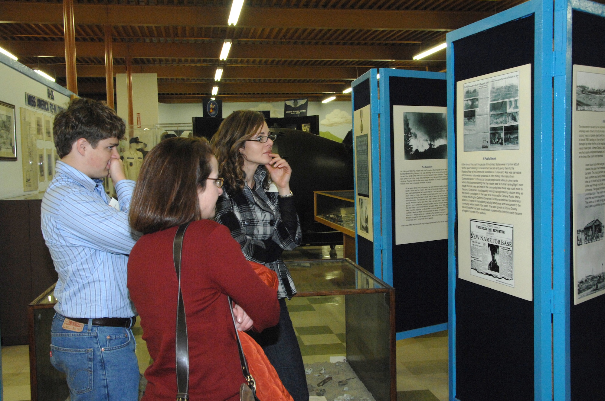 Ray Neuberger, Ashleigh Travis-Collins, Jennalie Travis-Lyons, decedents  of Brig. Gen. Robert Travis, Travis Air Force Base's namesake tour the  Jimmy Doolittle Air and Space Museum during their visit to Travis. (U.S. Air Force photo/Nan Wylie)
