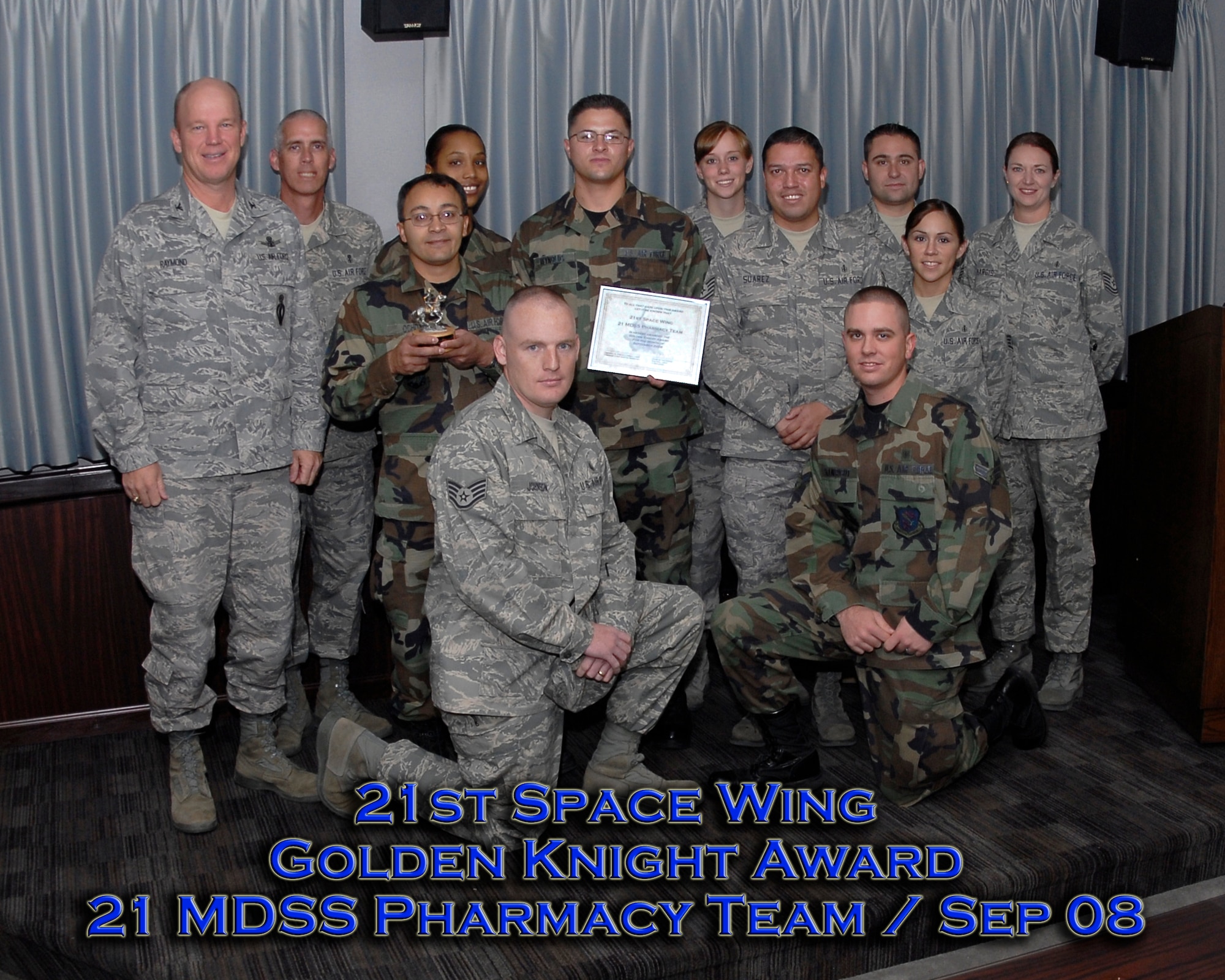 The Sept. 2008 Golden Knight Award is presented to the 21st Medical Support Squadron Pharmacy Team for their essential role in the success of the pharmacy move from Sept. 5-8, while maintaining regular business hours.  This accomplishment took precise timing of equipment movement to maintain patient care capability in the old pharmacy area through Sept. 5.  Teams had exact times for each segment of the move to avoid costly delays.  The move was so successful there was zero mission stoppage or lost patient time. (Air Force photo/ Rob Bussard)     