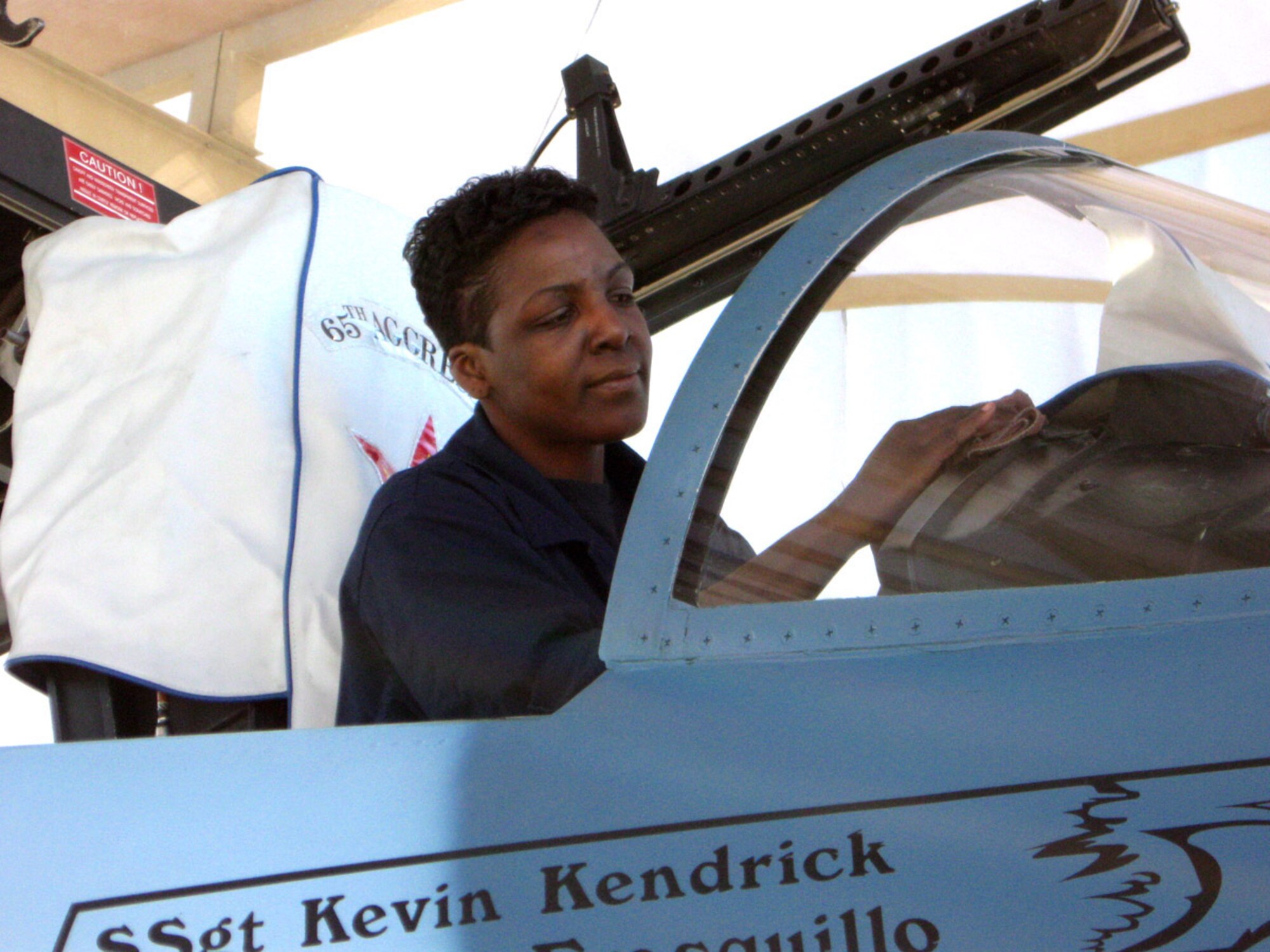 Tech. Sgt. Denise Patterson, an F-15 crew chief, cleans the cockpit of an F-15 Eagle aircraft to be on display during Aviation Nation at Nellis Air Force Base, Nev. on Nov. 8 and 9. As an Active Guard Reserve member in the 926th Group here, Sergeant Patterson works alongside regular Air Force members on a daily basis to maintain the F-15s.   