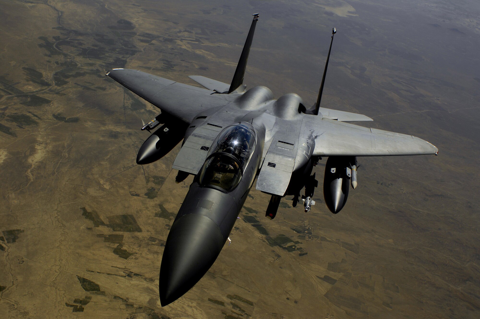 An Air Force F-15E Strike Eagle aircraft returns to the fight after receiving fuel from a KC-135R Stratotanker during a mission over Afghanistan. The F-15E Strike Eagle is a dual-role fighter designed to perform air-to-air and air-to-ground missions. (U.S. Air Force photo/Master Sgt. Andy Dunaway) 