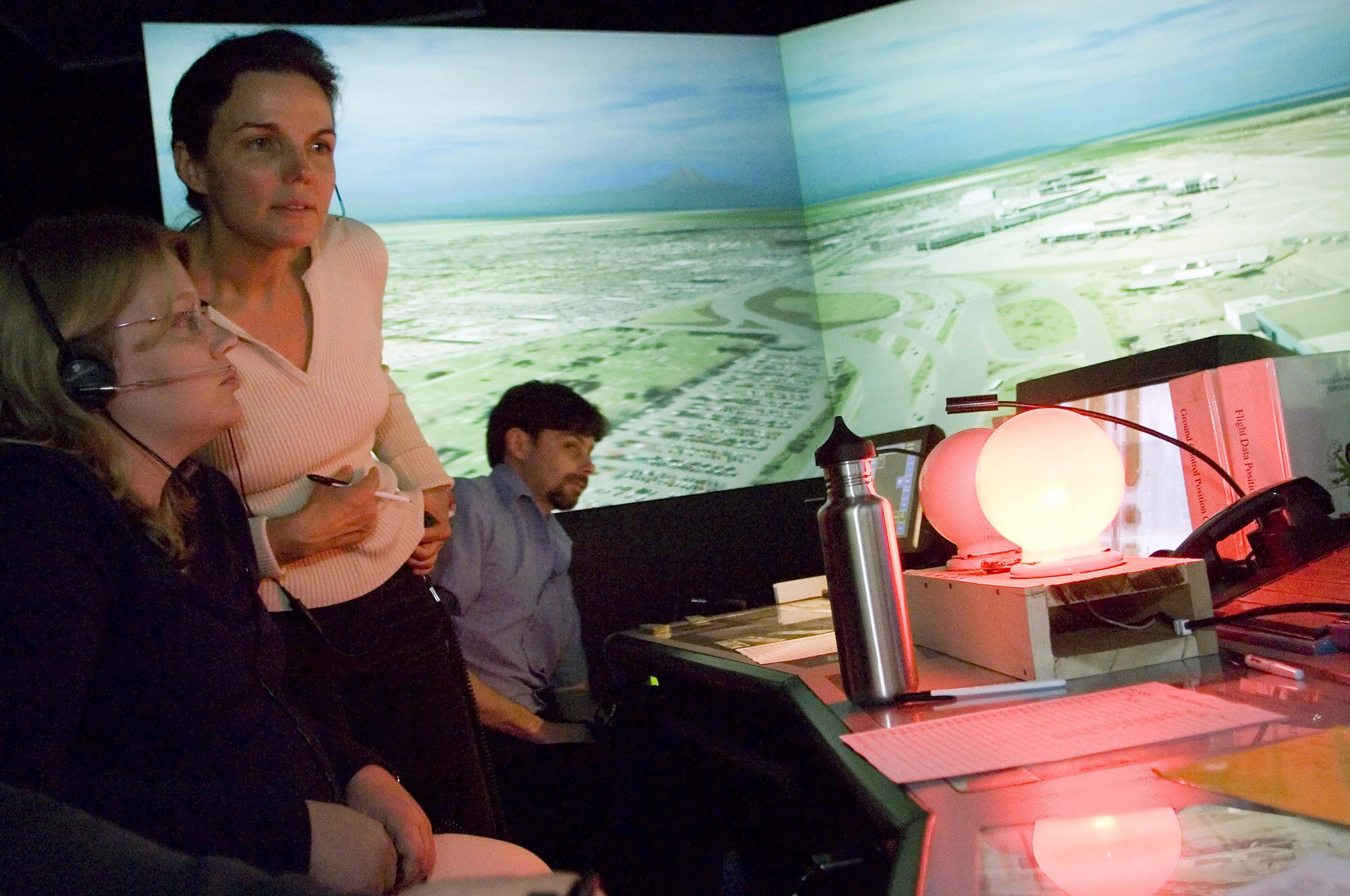 Jeanette Roller monitors simulated traffic while undergoing training Nov. 4 at McChord Air Force Base, Wash. Ms. Roller is a Seattle-Tacoma International Airport air traffic controller. (U.S. Air Force photo/Abner Guzman) 

