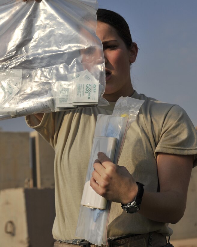 11/04/2008 ? SATHER AIR BASE, Iraq ? Senior Airman Danyelle Long, 447th Expeditionary Civil Engineer Squadron Emergency Management Flight equipment custodian briefs emergency responders on the contents of their chemical, toxic and biological hazard detection kits during an emergency response exercise at Sather Air Base in Baghdad. The exercise offered responders the opportunity to practice the proper operation of equipment designed to detect and identify hazards as well as become proficient with the proper use of protective equipment. Airman Long is a Montana Air National Guard Airman deployed from the 120th Fighter Wing. (U.S. Air Force photo by Master Sgt. Brian Davidson)