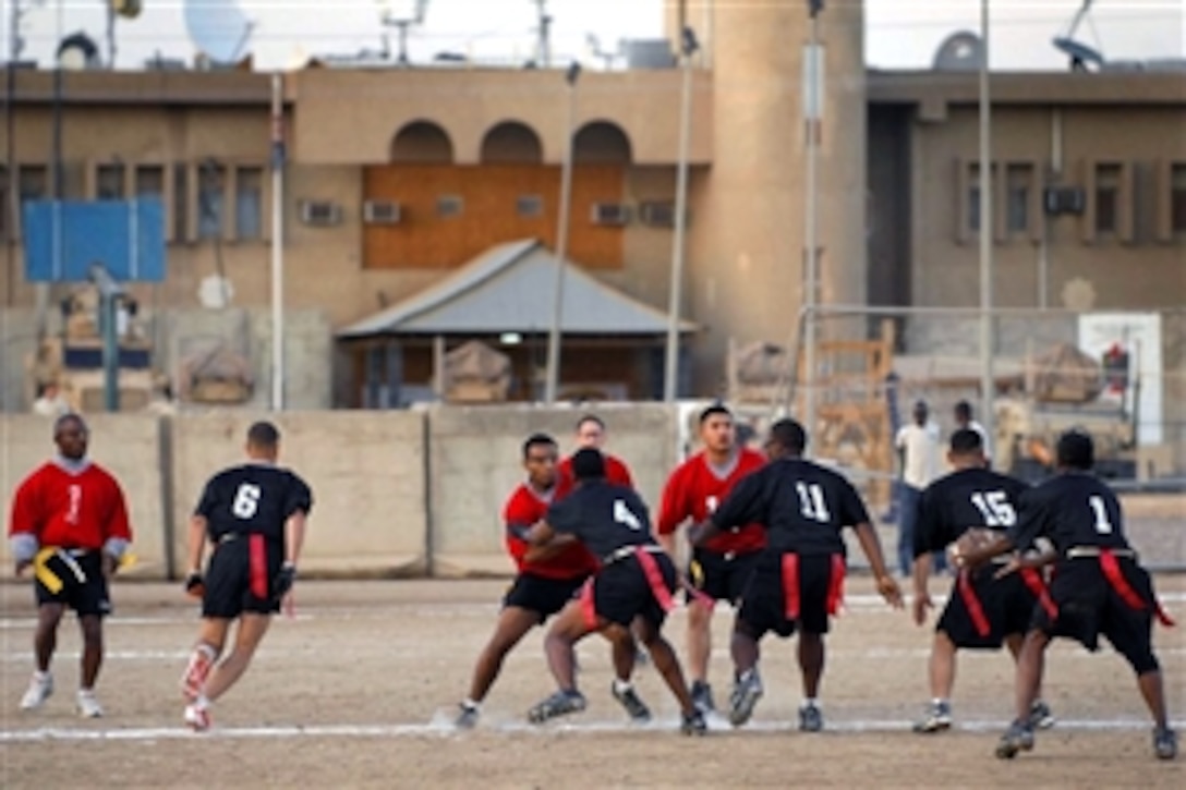 U.S. Army soldiers enjoy a flag football game on Forward Operating Base Falcon, in southern Baghdad, Iraq, Nov. 3, 2008. The soldiers are assigned to the 4th Infantry Division.