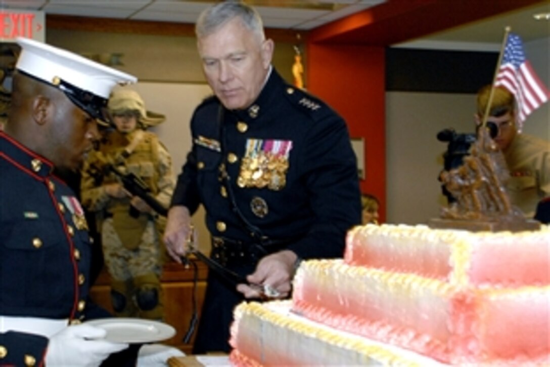 U.S. Marine Gen. James T. Conway, commandant of the Marine Corps, uses a traditional saber to cut the Marine Corps birthday cake. The Corps celebrated its 233rd birthday in the newly-opened Marine Corps Corridor in the Pentagon, Nov. 7, 2008. Guests included Secretary of the Navy Donald C. Winter, more than 100 Marines, sailors, civilians and other members of the joint staff. The Marine Corps was founded Nov. 10, 1775.