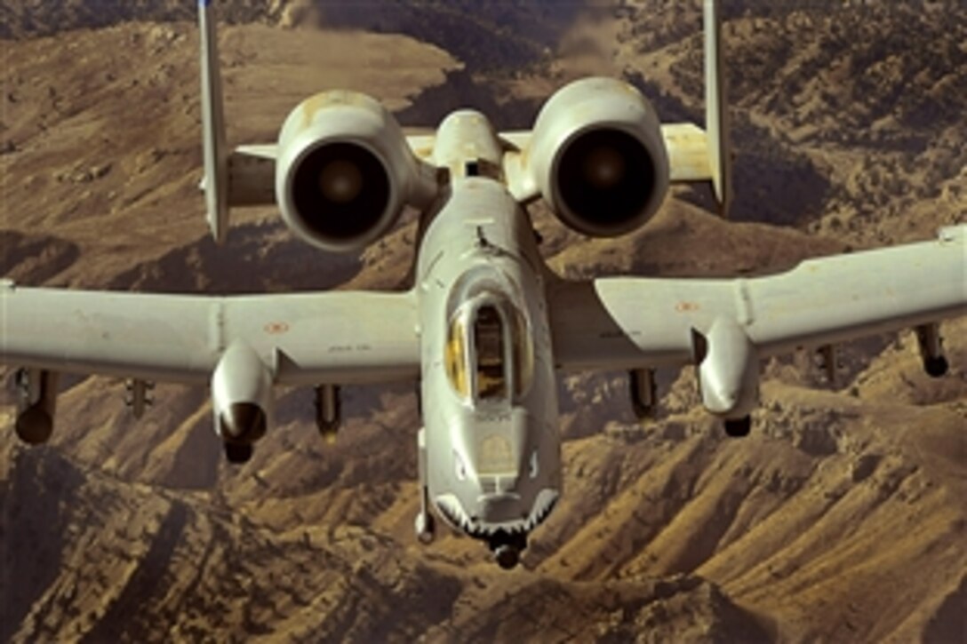 An A-10 Thunderbolt II flies a close-air-support mission over Afghanistan, Oct. 7, 2008. The close air support jet can employ a wide variety of conventional munitions and its 30mm cannon, which is capable of firing 3,900 rounds per minute.