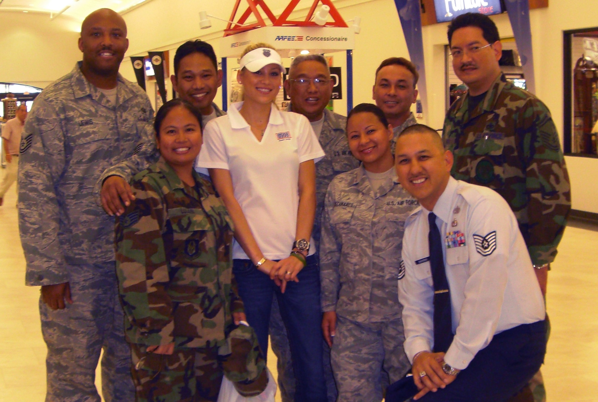 Internationally-recognized tennis pro Anna  Kournikova met with Reservists from the 44th Aerial Port Squadron and 724th Aeromedical Staging Flight while in Guam for a two-day tour sponsored by the United Service Organizations of Andersen Air Force Base and Naval Base Guam. 

“It was great, she was very pleasant,” said Staff Sgt. Armi Lynn Lujan. “All of us received signed autographed pictures of her.”

From left - Tech. Sgt. Emonie Lewis, Staff Sgt. Armi Lynn Lujan, Staff Sgt. Nate Habana, Ms. Kournikova, Master Sgt. Raymon Peredo,  Staff Sgt. Corina Manzanares, Master Sgt. Manuel Cruz, Tech. Sgt. Anthony Quichocho, and Senior Master Sgt. Carlos Shoda.
