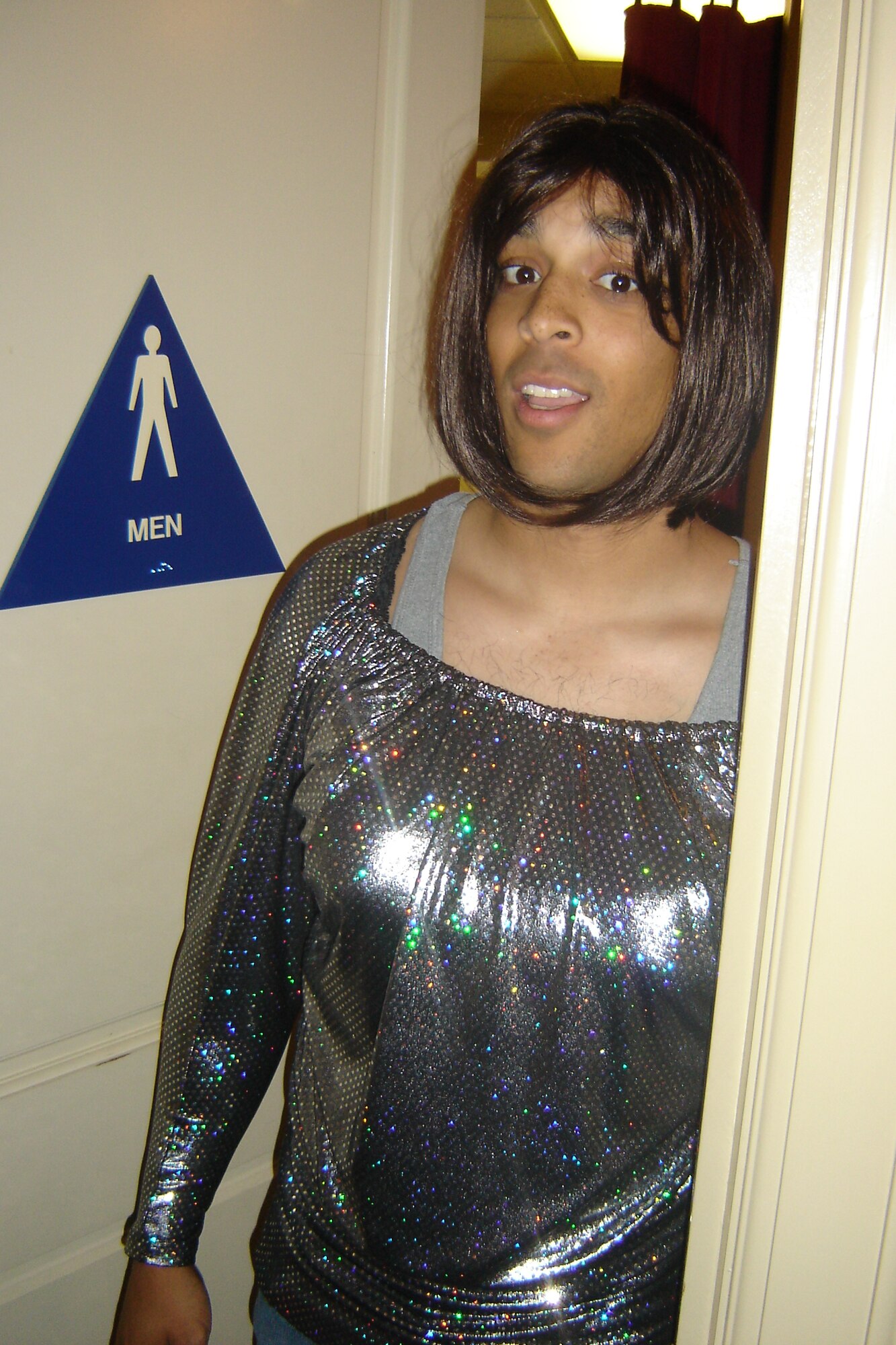 Marine GySgt. Charles Hudson, Recruiting Sub-Station Moreno Valley, costumes as a “A woman” Nov. 30, at an RS San Diego recruiters meeting at the Cultural Resources Center at March ARB. Marines were asked by their commanders to dress up in the Halloween costume of their choice for this regular meeting at March. (U.S. Air Force photo by Will Alexander)   

