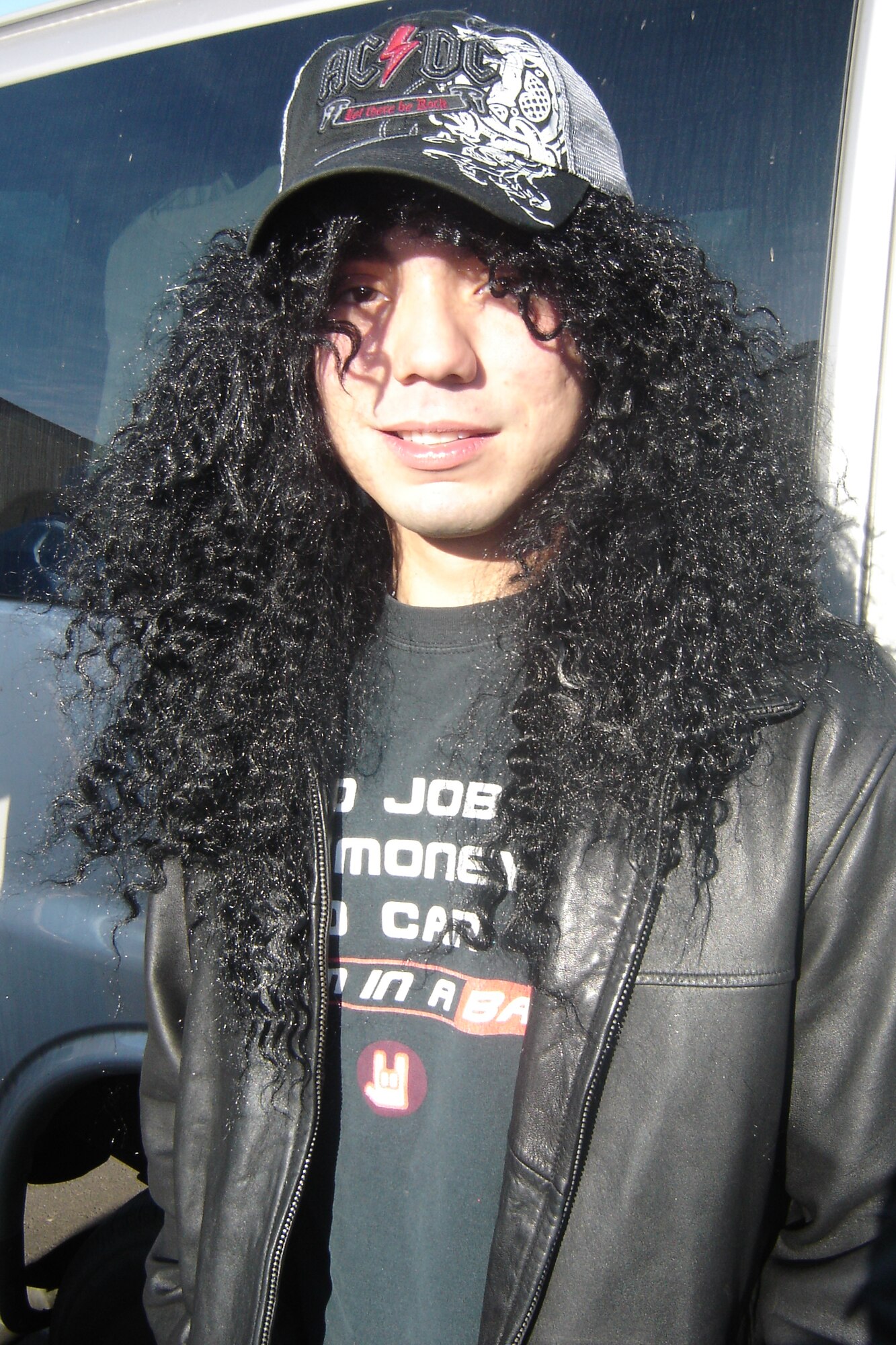 Marine Sgt. Samuel Delasantos, Recruiting Sub-Station Moreno Valley, costumes as a  “Rocker” Nov. 30, at an RS San Diego recruiters meeting at the Cultural Resources Center at March ARB. Marines were asked by their commanders to dress up in the Halloween costume of their choice for this regular meeting at March. (U.S. Air Force photo by Will Alexander)  