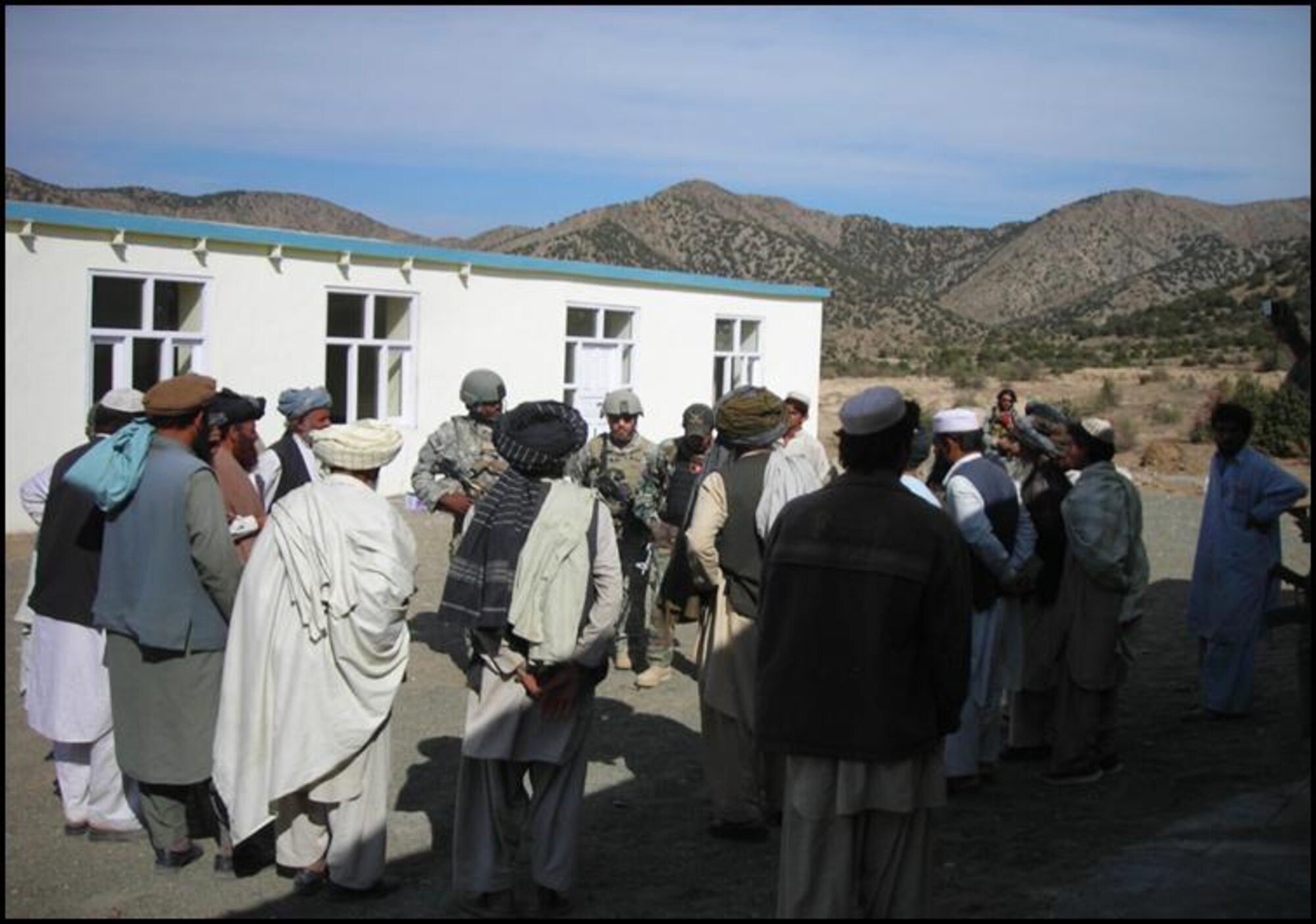 Tribal elders in Dand Patan District, Paktia province, give a dedication speech Nov. 6, at the opening ceremony of the new Moqbil Tribal Agricultural and Government Center.