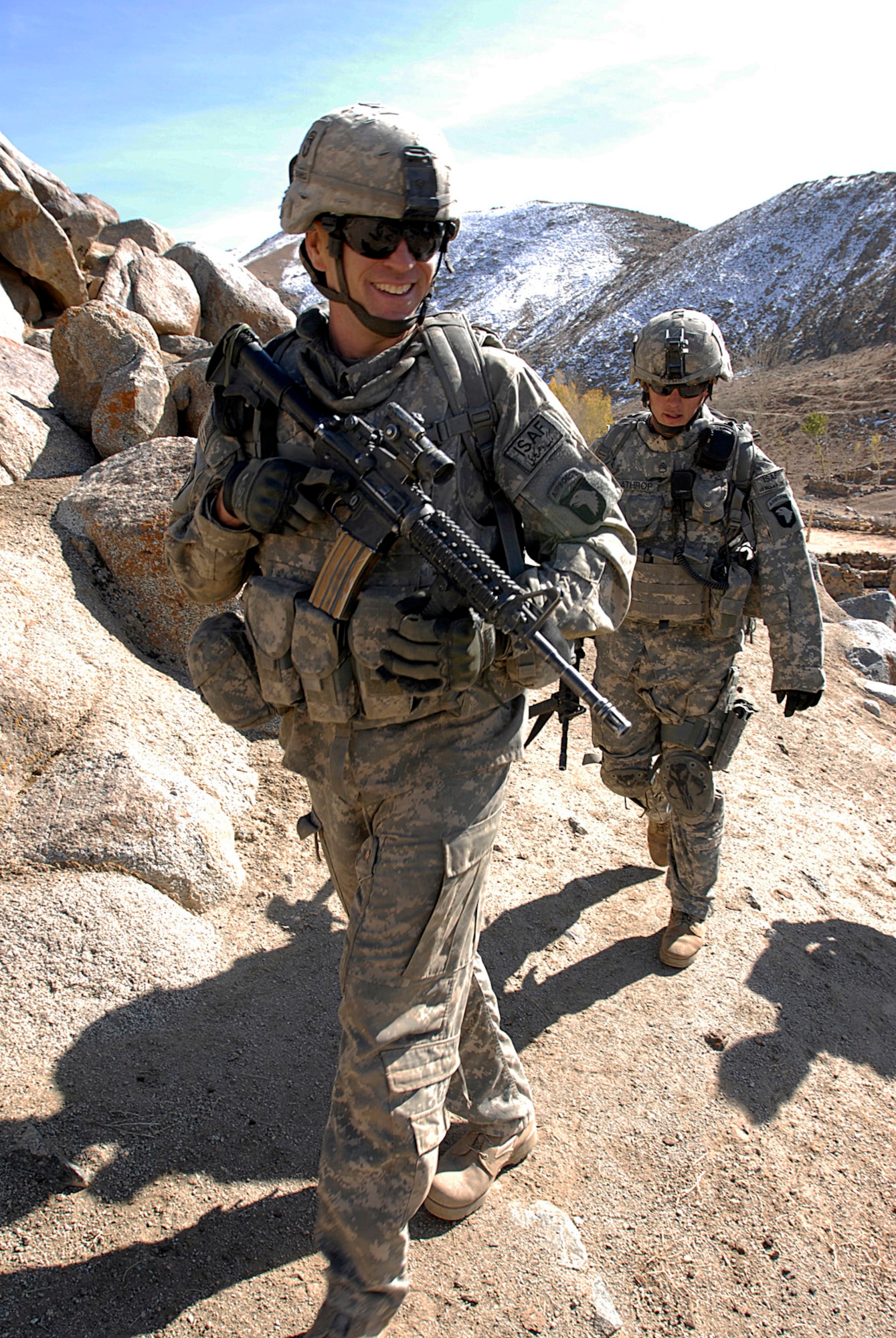 Spirits were high as Soldiers with Alpha Company, 101st Division Special Troops Battalion, 101st Airborne Division, scale a hillside during an air assault mission into a narrow valley in eastern Afghanistan, Nov. 4, 2008.  The Soldiers conducted a search of a small village in a valley, looking for IED making materials.  (Photo by Spc. Mary L. Gonzalez, CJTF-101 Public Affairs)