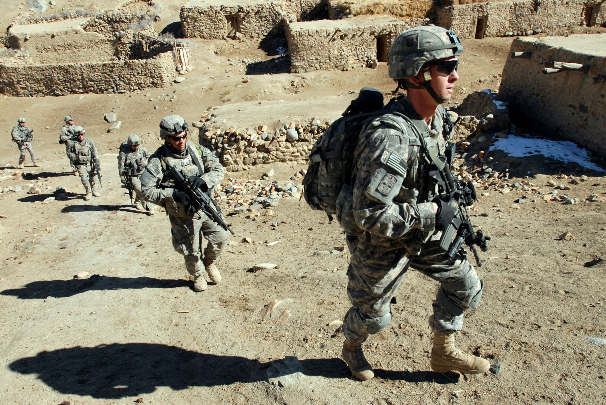 Soldiers with the 101st Airborne Division patrol a small village during an air assault mission in eastern Afghanistan, Nov. 4, 2008.  (Photo by Spc. Mary L. Gonzalez, CJTF-101 Public Affairs)