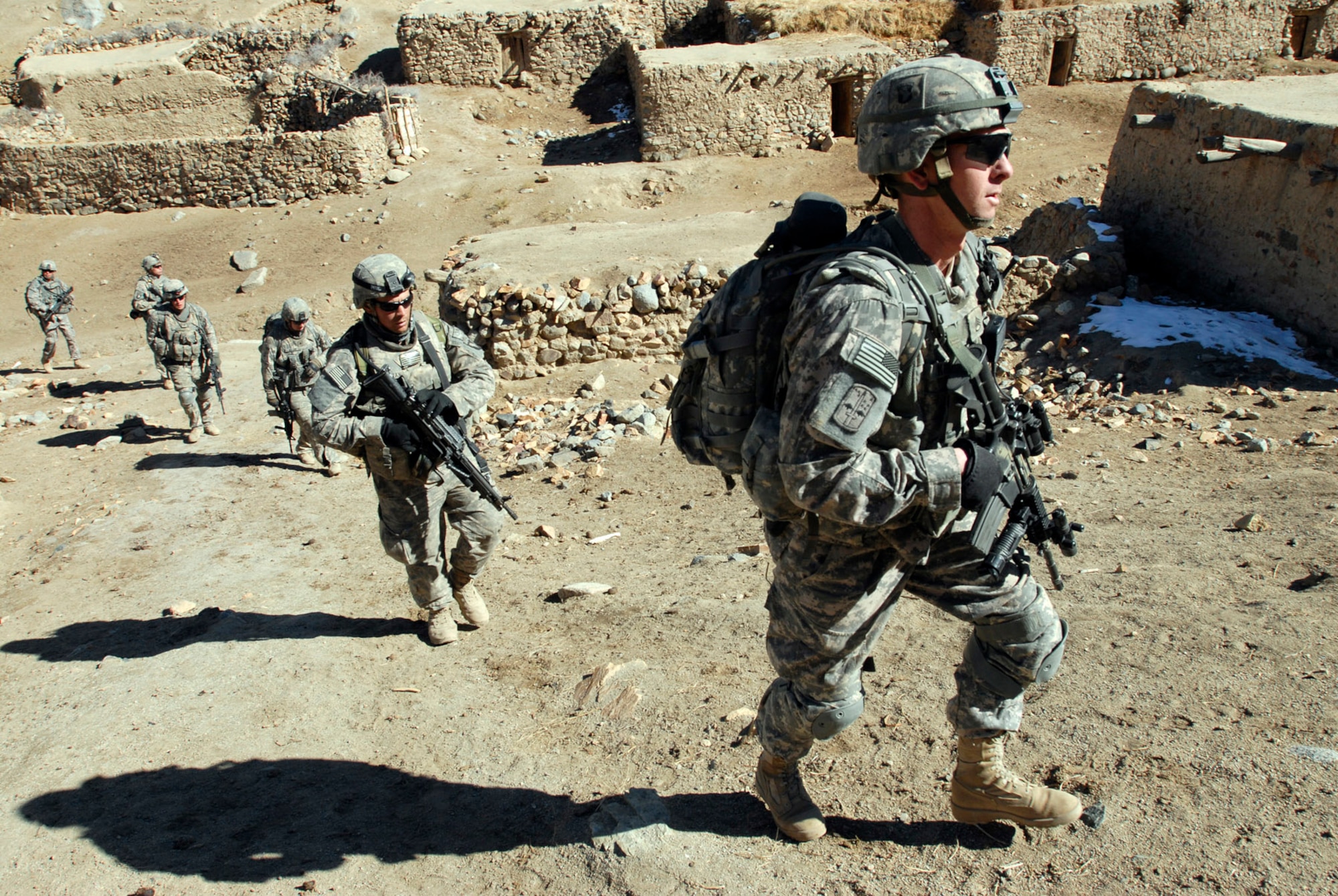 Soldiers with the 101st Airborne Division patrol a small village during an air assault mission in eastern Afghanistan, Nov. 4, 2008.  (Photo by Spc. Mary L. Gonzalez, CJTF-101 Public Affairs)