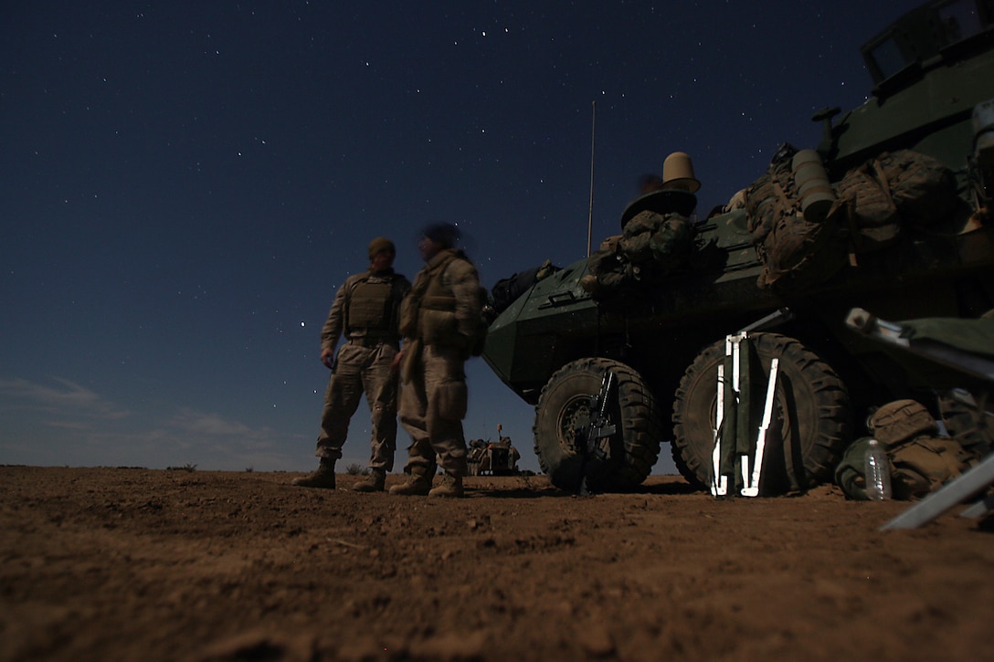 Marines with Company D, 1st Light Armored Reconnaissance Battalion prepare to bunk down for the night here Nov. 10. The “Diablos” of Company D recently accepted responsibility for battle space in the Nineweh province. The Marines relieved soldiers from the Army’s 3rd Armored Cavalry Regiment. Mission accomplishment for the Diablos is to enable stabilization of Mosul by maintaining presence in towns, villages and along trade routes used by foreign fighter facilitators and insurgents. The Marines make up one element of the first Marine Air Ground Task Force outside Anbar in Iraq since 2004. They traveled to the Nineweh province to kick off Operation Defeat Al Qaeda in the North II, an operation aimed at stamping out the insurgency just west of the restive city of Mosul.
