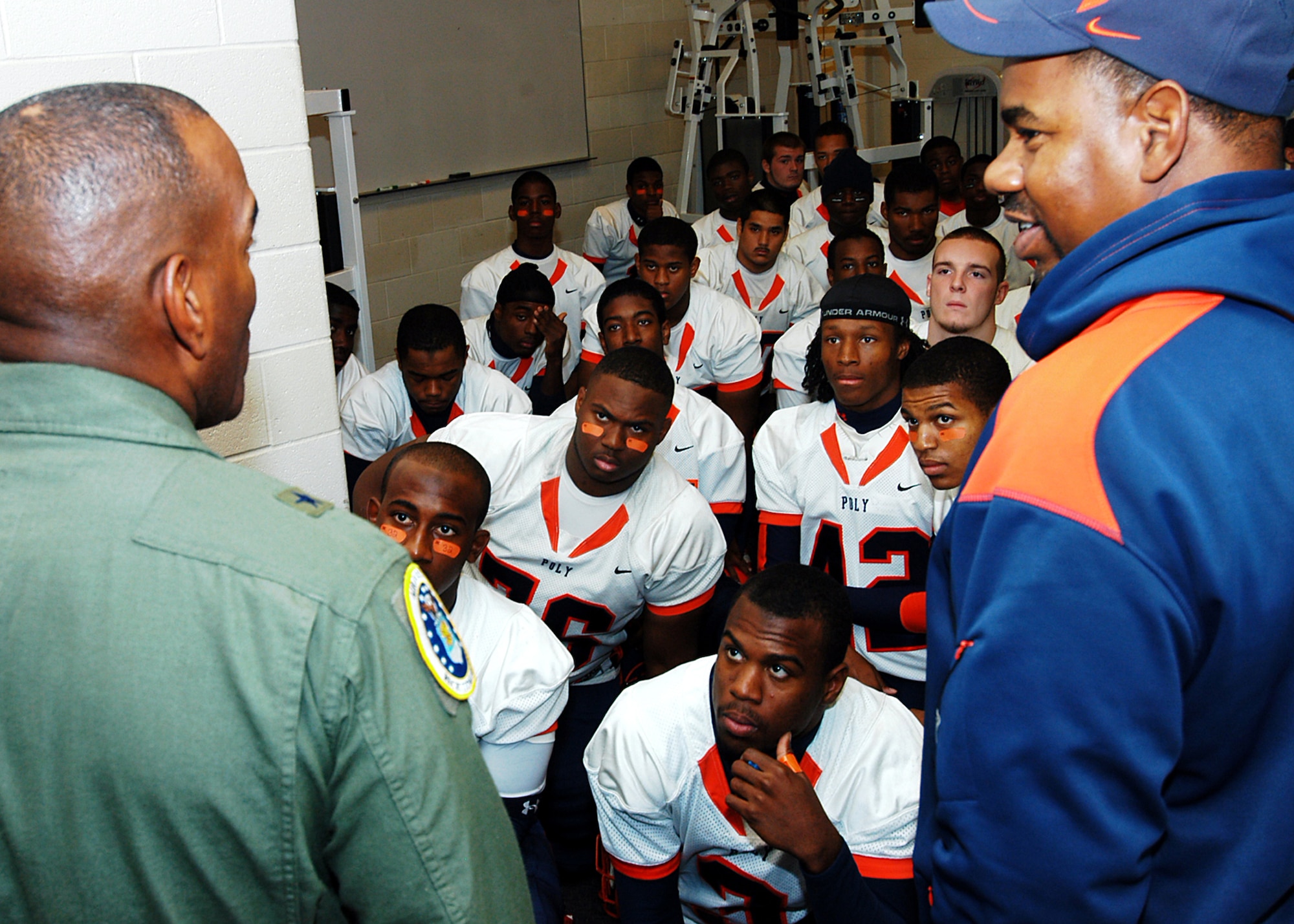 Air Force Recruiting Service Commander Brig. Gen. A.J. Stewart gives a pre-game pep talk to the Engineers Baltimore Polytechnic Institute high school’s football team, at M&T Bank Stadium Nov. 8. The Engineers were set to play its 119-year rival, the Baltimore City College high school Knights in the Air Force-sponsored iHigh Great American Rivalry Series. A Class of 1977 BPI alumni and varsity football wide receiver, General Stewart shared inspirational words with both teams before the game, and he presented one of two $500 college scholarships to Engineers player Arnold Farmer. BPI won the game 16-13. (U.S. Air Force photo/Tech. Sgt. Jennifer Lindsey)