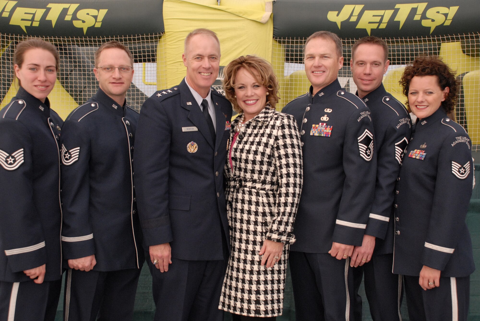Lt. Gen. Dick Newton, deputy chief of staff for manpower and personnel at Air Force Headquarters at the Pentagon, and wife Jody, pose with members of the U.S. Air Force Academy Band Blue Steel during the New York Jets military appreciation football game Nov. 9 at Meadowlands Stadium in New Jersey. Blue Steel opened the game with a performance of the National Anthem. (U.S. Air Force photo/Staff Sgt. Monique Randolph