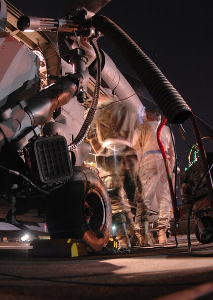 MOODY AIR FORCE BASE, Ga. -- During a week-long deployment training exercise the 41st Rescue Squadron performed a variety of sorties ranging from recovering injured pilots to in-flight refueling here November 6. Airmen of the 723rd Aircraft Maintenance Squadron perform around the clock repairs and maintenance to keep the pace of twelve sorties a day during the 41st RQS training week.  (U.S. Air Force Photo by Senior Airman Javier Cruz)