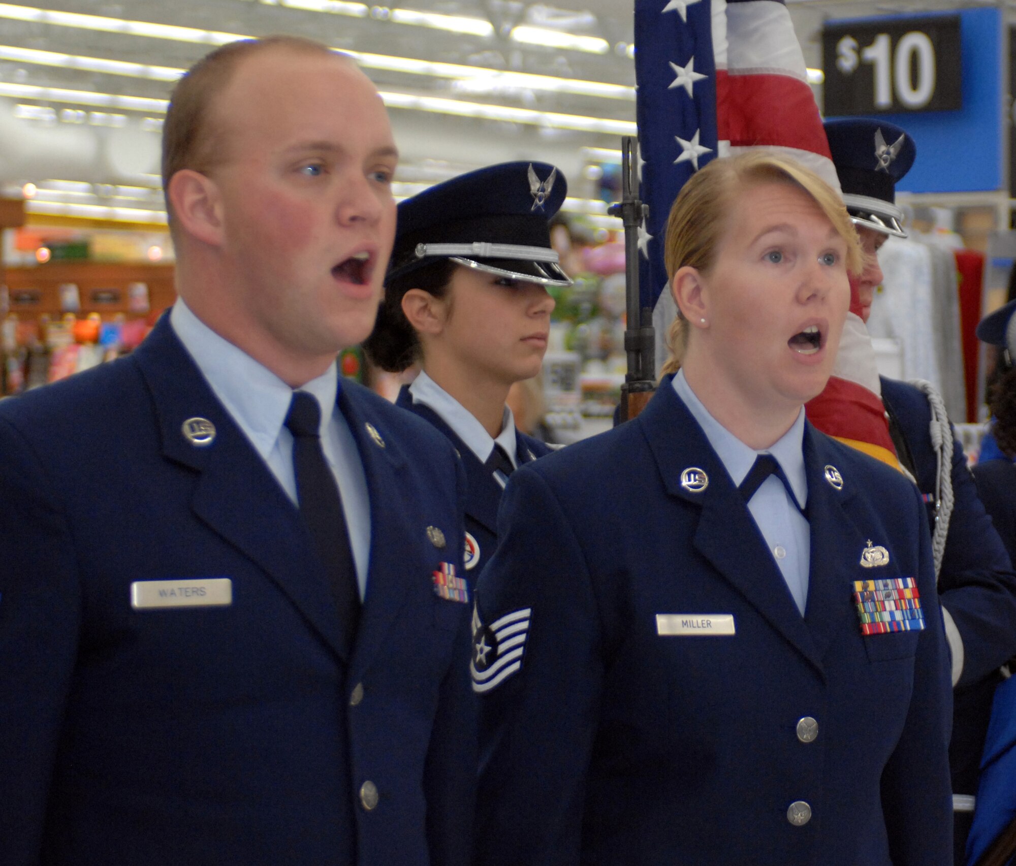 MOUNTAIN HOME AIR FORCE BASE, Idaho --The Singing Stripes perform at the grand re-opening of Wal-Mart Aug. 12. The Singing Stripes perform at numerous functions throughout Idaho during the year as a way for Mountain Home AFB to reach out to the community. (U.S. Air Force photo/ Airman 1st Class Ashley Tank)