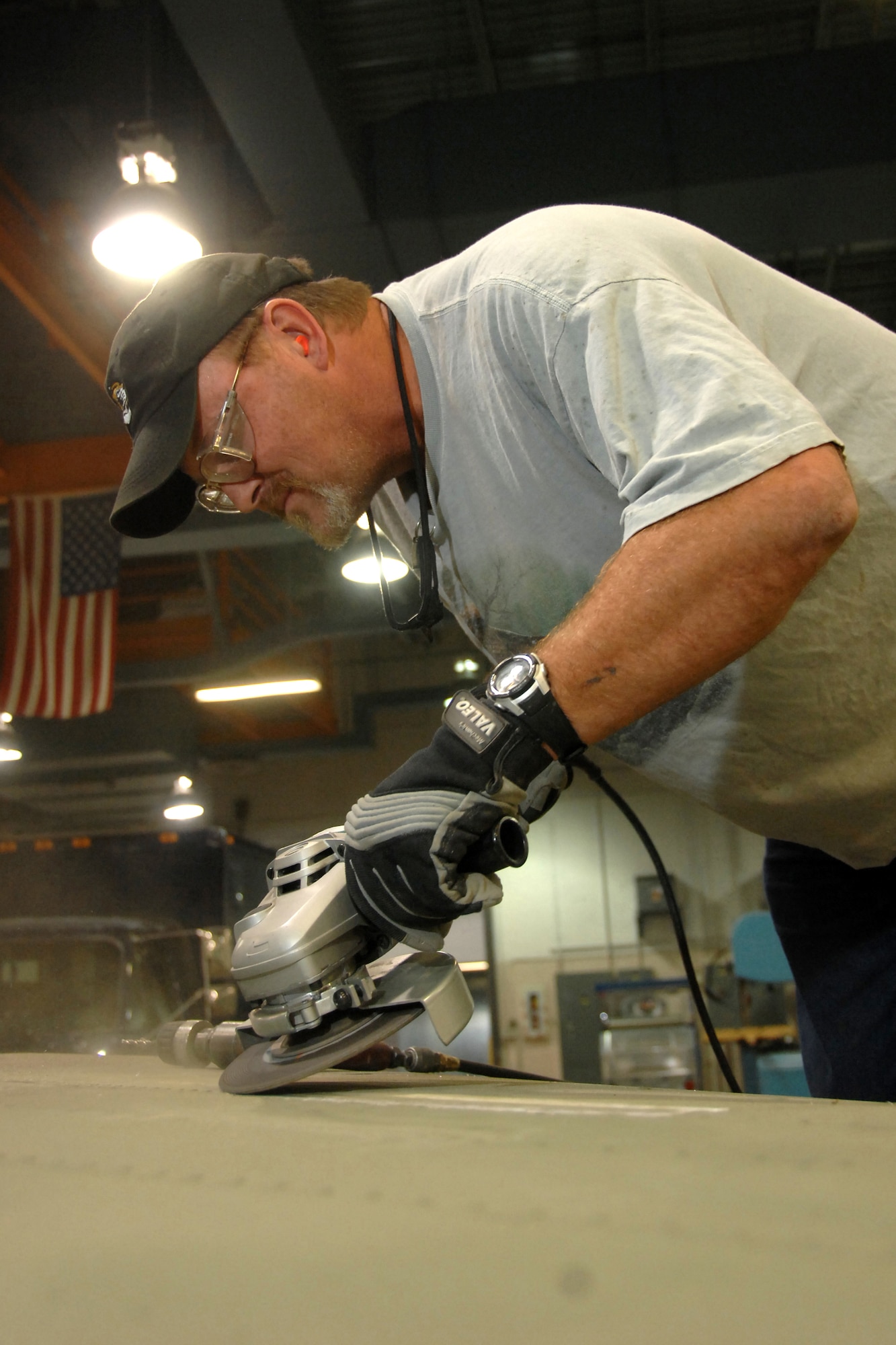 OFFUTT AIR FORCE BASE, Neb. -- Warren Darr, an aircraft structural maintainer and squadron information manager assigned to the 55th Maintenance Squadron, grinds down rivets on the horizontal stabilizer of a B17 static display aircraft Nov. 5 in order to remove corroded sheet metal to ensure structural integrity of the historic air frame. This effort is part of a lengthy frame-off restoration of this historic aircraft located by the SAC gate. 

U.S. Air Force Photo by Josh Plueger
