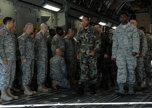 Members of the Charleston AFB Honor Guard exit a C-17 during a ceremony that was part of chaplain training here Nov. 6. More than 100 Army chaplains from the U.S. Army Chaplain Center and School in Fort Jackson, S.C., attended the training to learn about ramp and flightline ceremonies. (U.S. Air Force photo/Airman 1st Class Katie Gieratz)