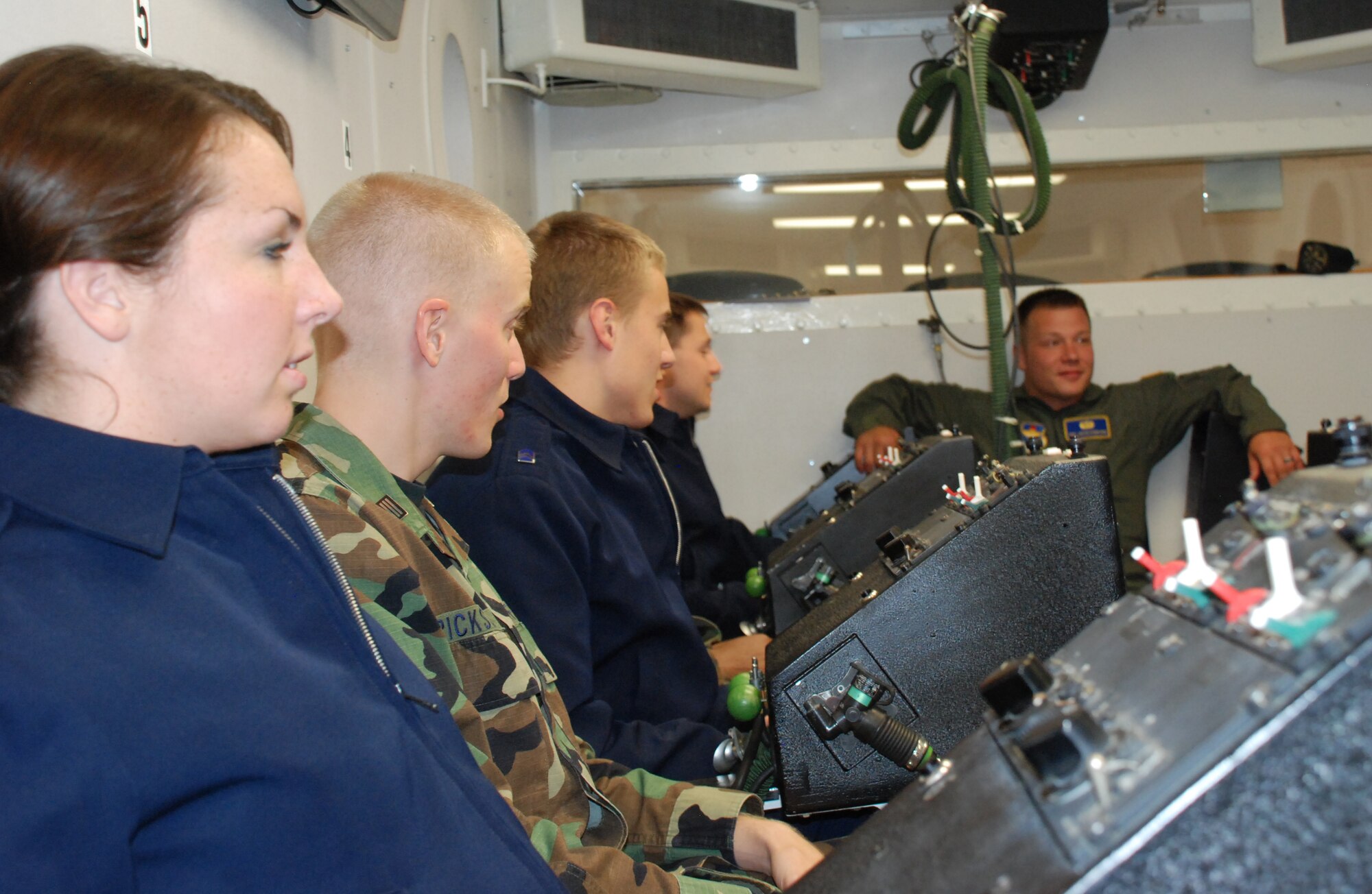 University of North Texas ROTC cadets learn what it's like to for pilots to fly in aircraft Nov. 7 at Aerospace Physiology in the altitude chamber. The altitude chamber  simulates altitude changes while flying and allows pilots to experience hypoxia . Twenty-seven cadets toured Sheppard's facilities including the Heritage Center, T-38 simulaters, the F-22 maintenance training facility and the 82nd Security Forces Squadron Canine Arena. (U.S. Air Force photo/Airman 1st Class Candy Miller) 