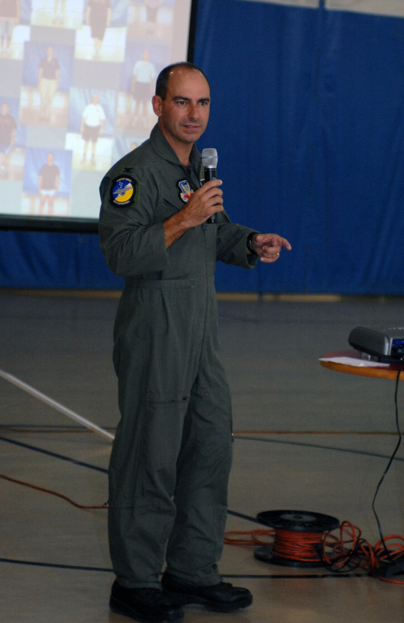 Col. Jeff Harrigian, 49th Fighter Wing commander, speaks at the Biggest Loser awards ceremony at the Fitness and Sports Center at Holloman Air Force Base, N.M., Oct. 31. A total of 17 teams participated in the Biggest Loser challenge with a common goal; to lose weight. All together, the total weight loss was 1,078 pounds.(U.S. Air Force photo/Airman Sondra M. Escutia)