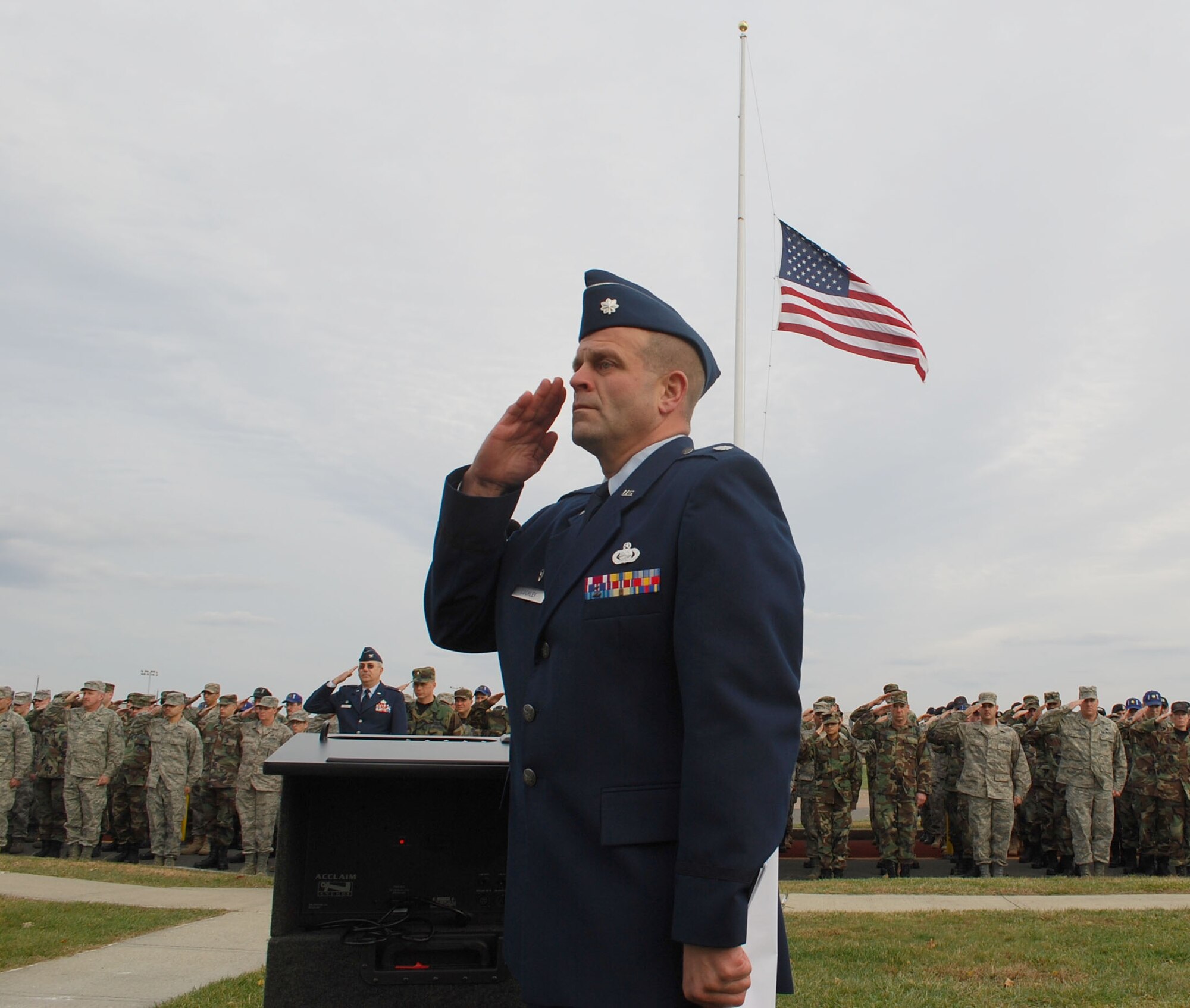 Lt. Col. Richard Cockley salutes during the 439th Airlift Wing?s annual retreat ceremony held at the Base Ellipse Nov. 1. Colonel Cockley is commander of the 58th Aerial Port Squadron and earned the Bronze Star for his service while deployed in Afghanistan from January to May. The retreat cermony also included the playing of Taps and honors all of the nation?s veterans. (photo by Tech. Sgt. Andrew Biscoe)