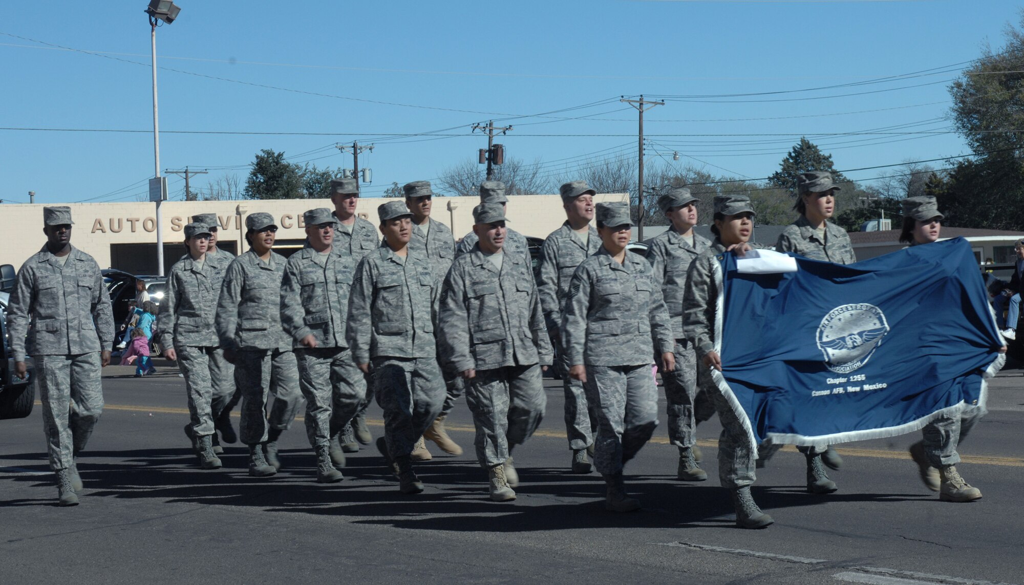 CANNON AIR FORCE BASE N.M. -- Tech. Sgt. Charles Jenkins (left), 27th Special Operations Mission Support Squadron, calls cadence for the Air Force Sergeants Association as they march down Main Street in the Veterans Day parade Nov. 8. (U.S. Air Force photo by Airman 1st Class James R. Bell) 