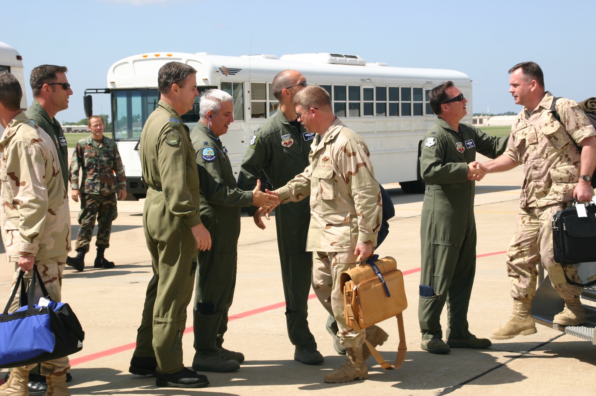Members of the 960th Expeditionary Airborne Air Control Squadron are greeted and thanked by Col. Joe Rossacci, vice commander, 552d Air Control Wing, and other wing leadership as they return home after the four and a half month deployment. Photo courtesy of 1st Lt. Kinder Blacke.