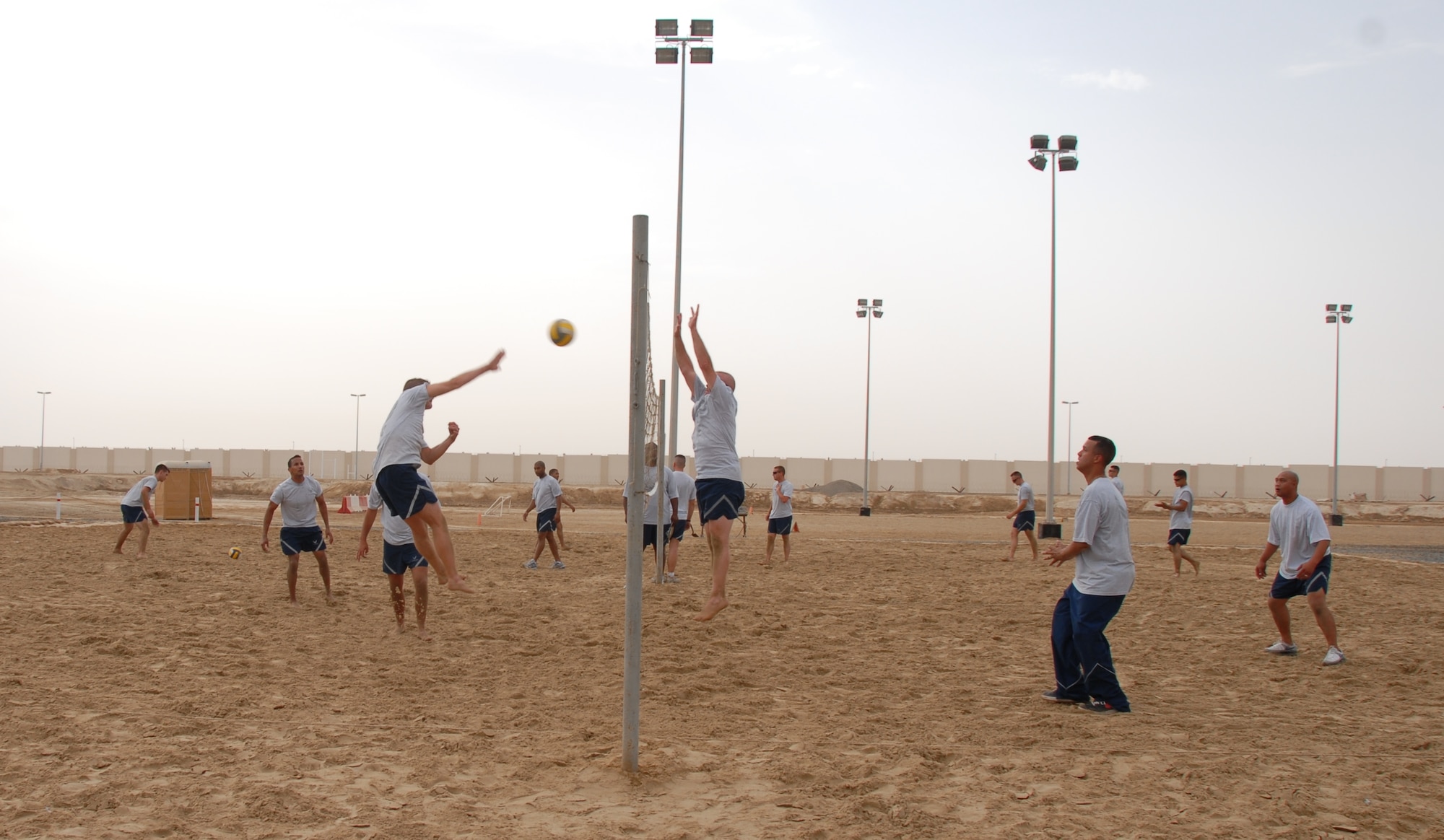 Members of the 960th EAACS relax by playing a little desert volleyball! Photo courtesy of 380 AEW/PA.