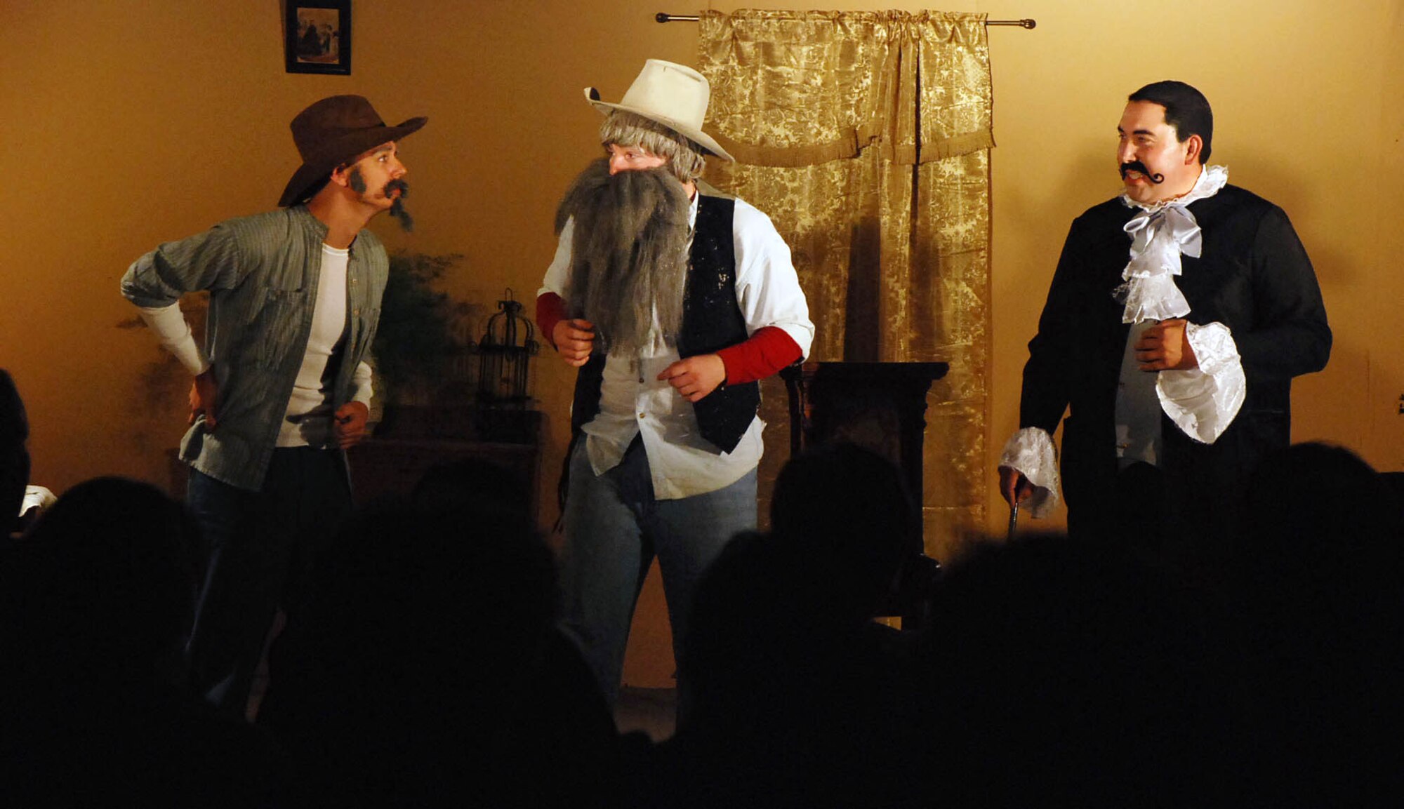 LAUGHLIN AIR FORCE BASE, Texas – Senior Airman Blake Lapp as Side Kick and Tech. Sgt. Keith Lewis as Ole Timer, both with the 47th Medical Operations Squadron, perform  a scene in the “Shame of Tombstone” melodrama put on by the Whitehead Museum in downtown Del Rio recently. (U.S. Air Force photo by Airman 1st Class Sara Csurilla)
