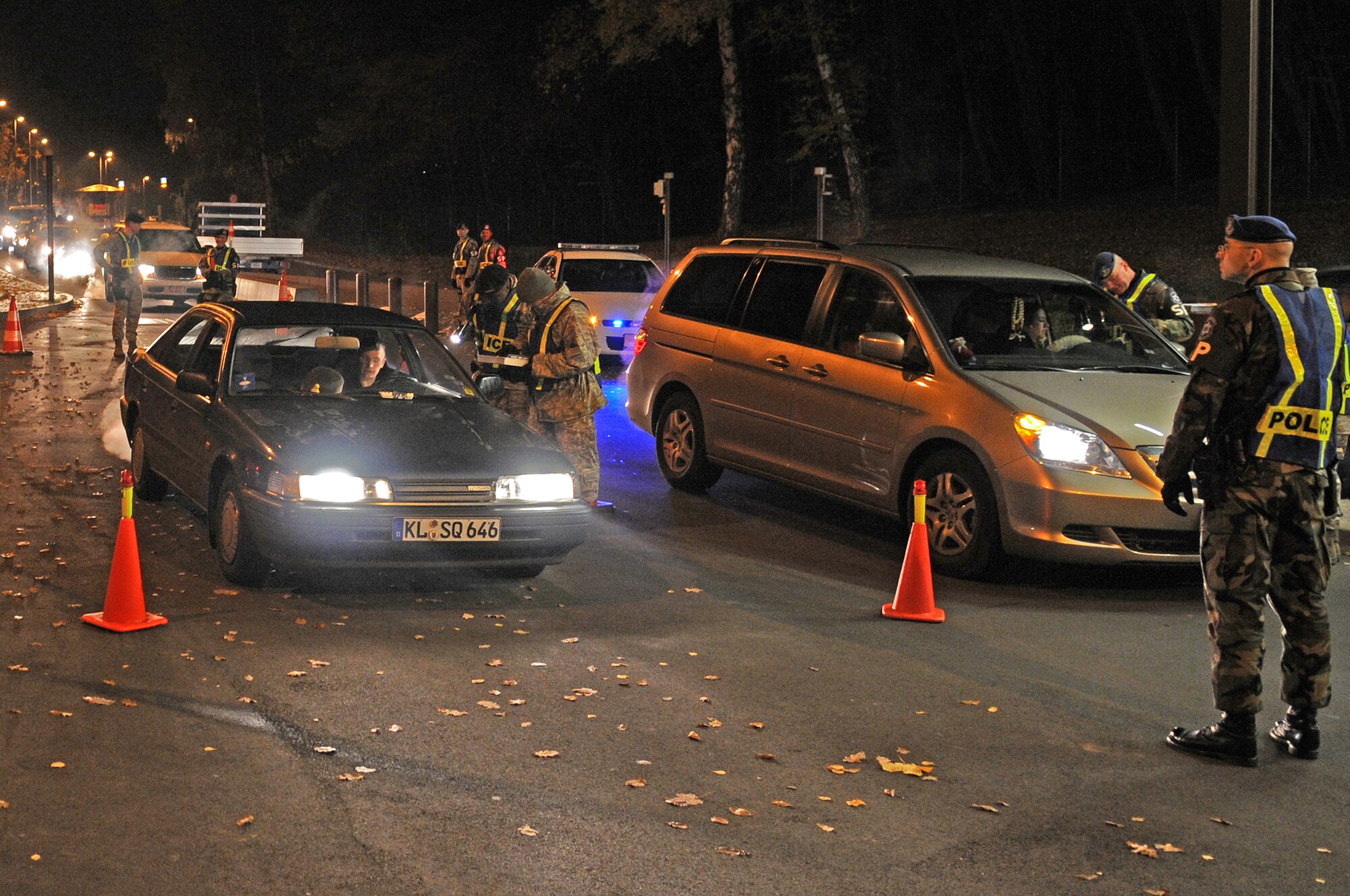 U.S. Military Police along with German military members conduct a random DUI Enforcement checkpoint Ramstein Air Base, Germany, Nov. 8, 2008. The DUI Enforcement checkpoint turned out to be successful with no intoxicated drivers. (U.S. Air Force photo Airman 1st Class Grovert Fuentes-Contreras)