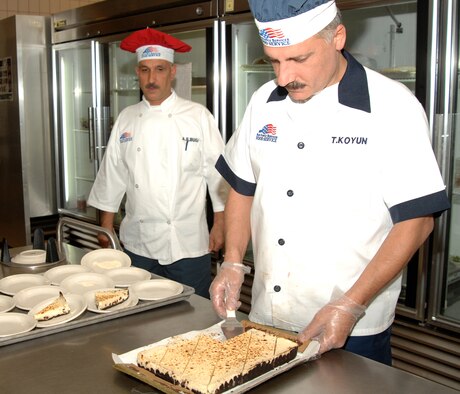 Tuncay Koyun, 39th Force Support Squadron dining facility baker, prepares a dessert tray at the Sultan’s Inn dining facility. The Incirlik dining facility won the United States Air Forces in Europe Food Service Excellence Award and will compete against other bases in the Air Force-level John L. Hennessy Award. (U.S. Air Force photo by Jennifer Brooks)