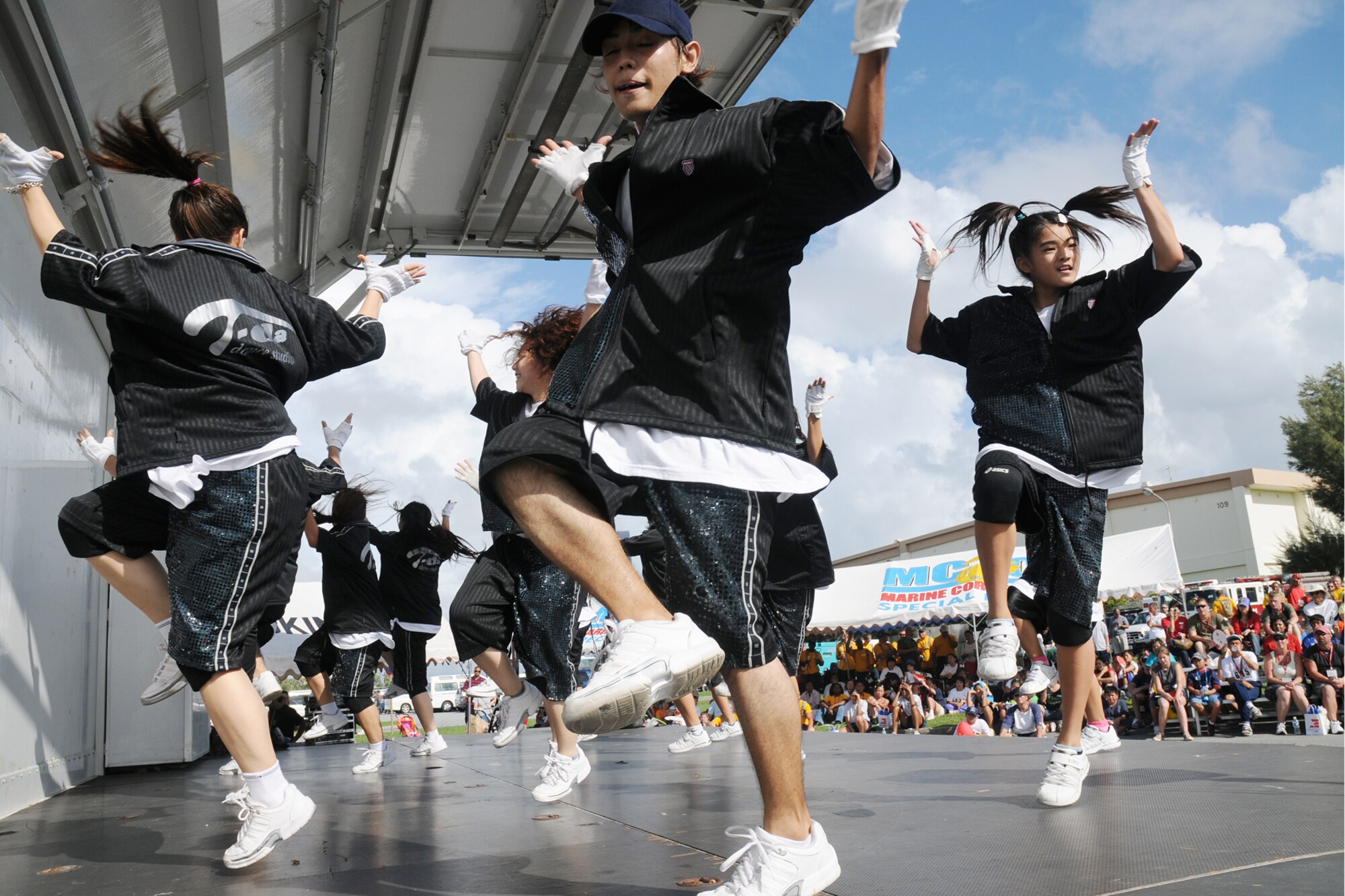 Members of the T-Da Dance Studio perform for the crowd during the Kadena Special Olympics Nov. 8, 2008. Kadena Air Base hosted the 9th Annual Special Olympic Games and Art Festival for special needs Okinawan and American athletes.  (U.S. Air Force photo/Airman 1st Class Chad Warren)
                                             